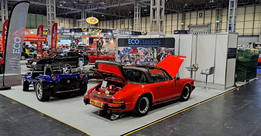 The ECO CLASSICS stage is set! looking forward to meeting you all today at the NEC Classic car show today #necclassiccarshow #electriccarsarethefuture #mikacars #porsche911turbo #classicporsche #electricporsche #etypejag #electricetype