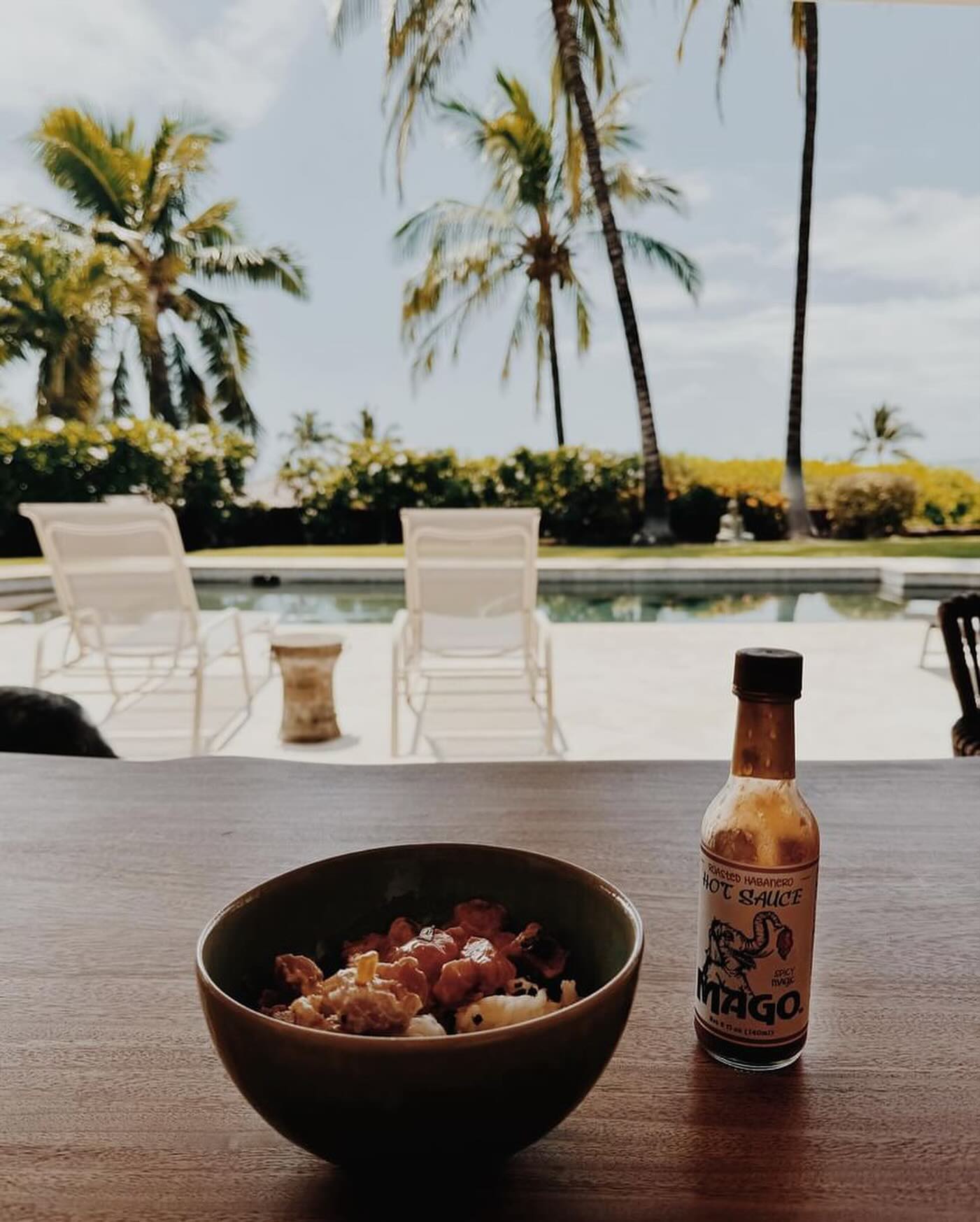 Spicy Magic on island time with our friend @kshandesign using our roasted habanero sauce with some poke 🌶