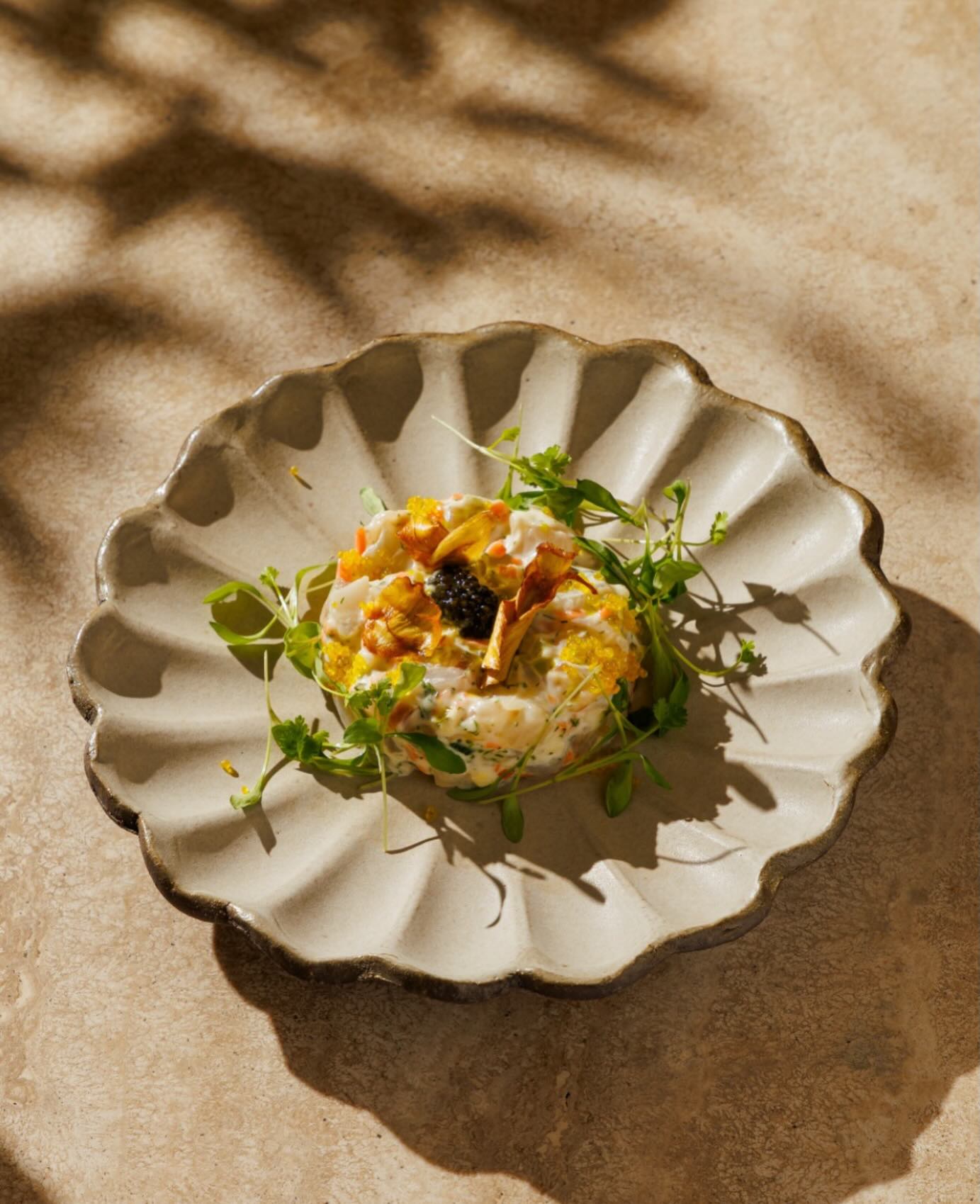 Our beautiful Angelica scalloped bowl has found a new home at @fenixrestaurantlondon and will soon be served at @fenixrestaurants in Manchester. We had an amazing time collaborating on this order with such incredible pieces. Can't wait to visit the restaurant soon! #handmade #restaurant #plates #design #pottery