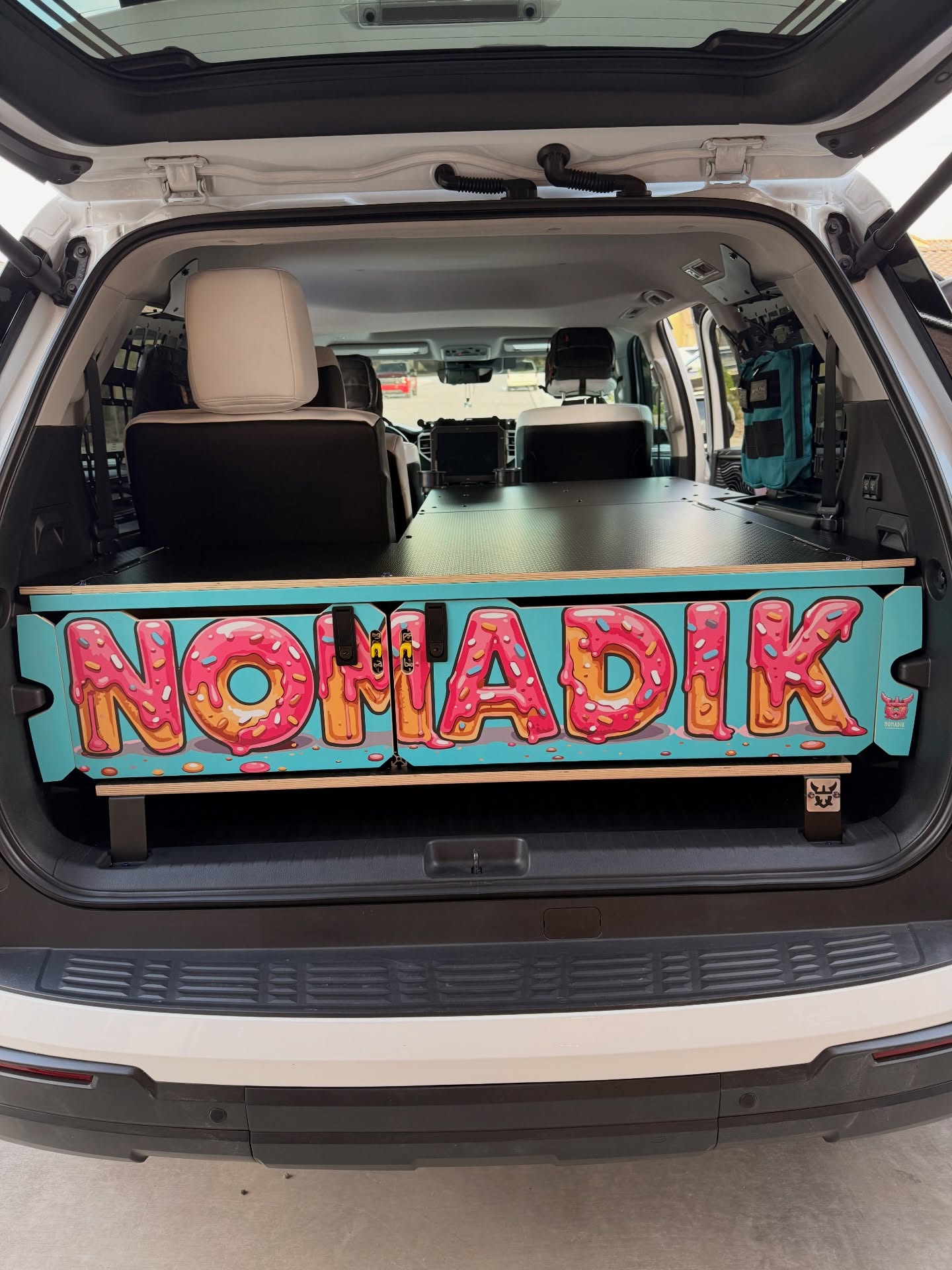 I'm obsessed with this faceplate wrap on my 3rd Gen Sequoia! This build turned out amazing! Plus, we added a removable sleeping platform with nearly 7ft of bed space!