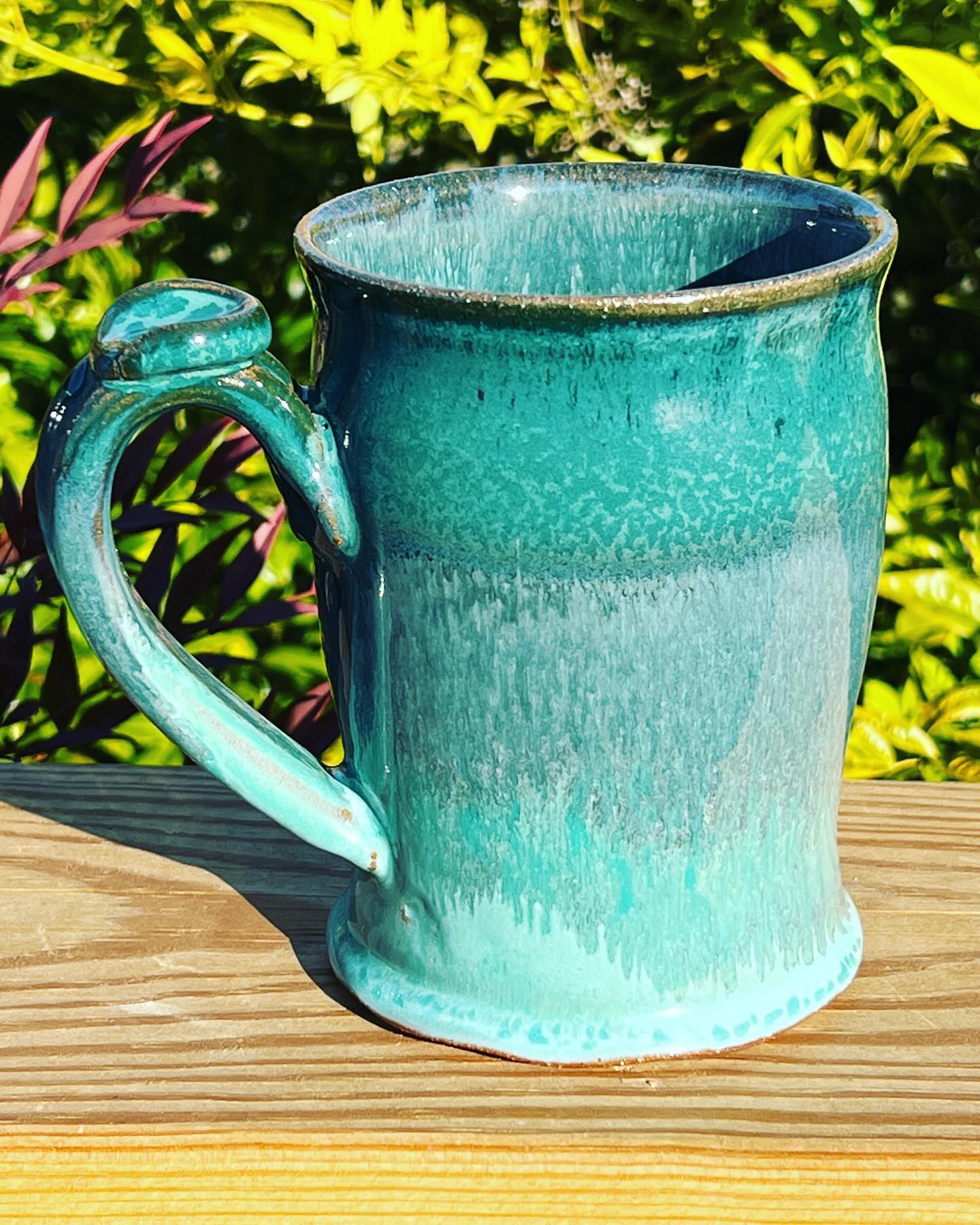 Can you tell the difference between these two mugs? It's the same two glazes...so what do you think is different??