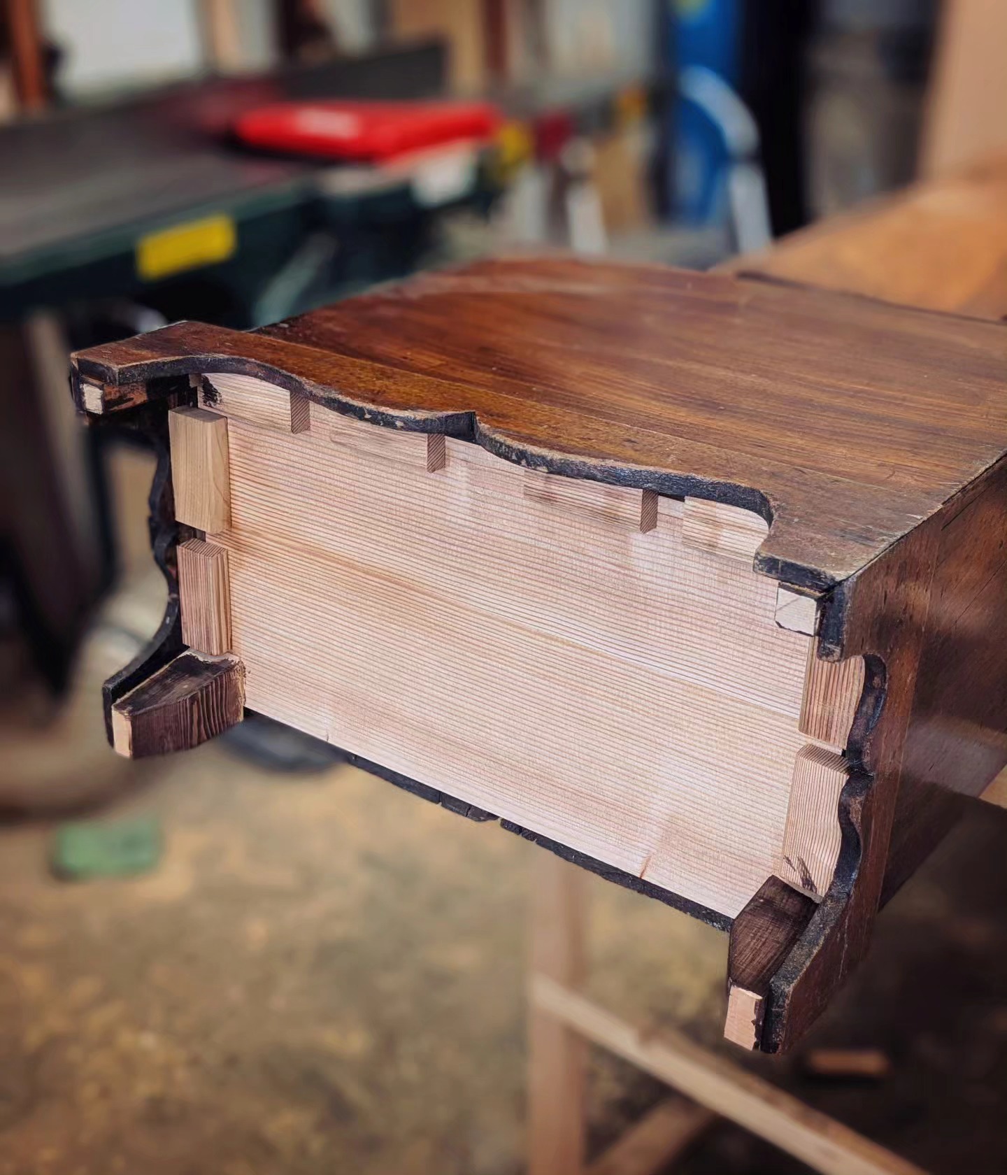 Clock weights are heavy. So when the cable they rise and lower upon snaps....goodbye, clock bottom panel.
This one might have been replaced a few times as there are several sets of nail holes (behind the foot panels) to the point where adding new ones seems like a bad idea. So the new bottom is secured with glue blocks. The next restorer will just have to remove the glue blocks (and not the feet) and pop a new bottom panel in if the weights fall again.
#furniturerestoration #furniturerestorer #furniturerepair #tallclock #mahoganyclock #hideglue #restoredinbaltimore