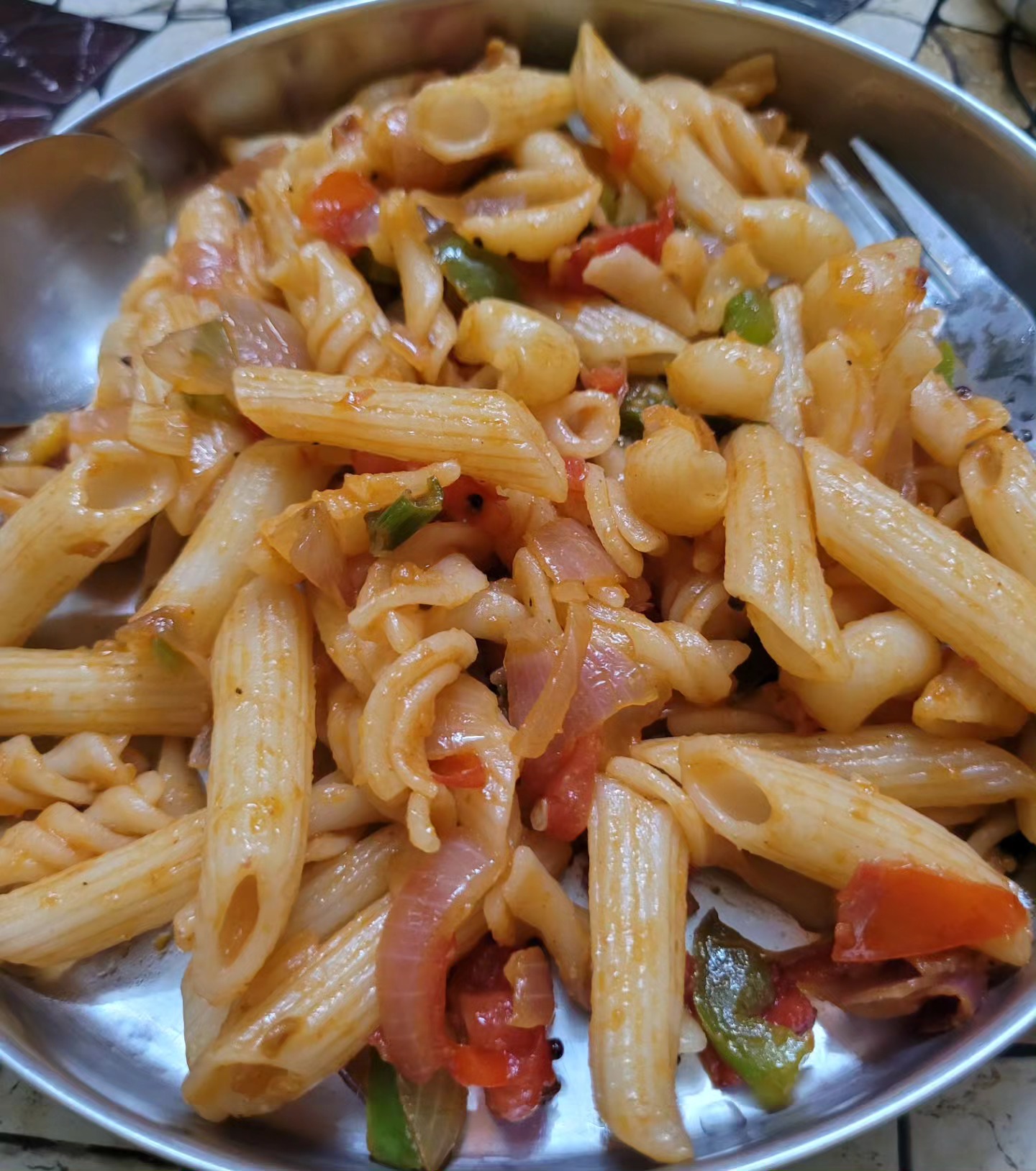 Pasta 😋
The word pasta stirs up a deep feeling in me... of comfort. I don't know why. I don't know how. Or maybe I can take a guess.
As a kid, my mom did cook macaroni for me sometimes and I loved it. But it was sometime during my hostel days in Bachelors that I got to the essence of it, tried making it myself, or ate when my roommates did. It was the Indie version we tried back then. But while living with my parents and then alone while working, I tried several versions of it... based on the materials and my mood. That's when I got to know the different types, flavors and probably also started loving the experience of making it.
It's a fact that I love Pasta. But if I can make it, I love it even more. Coming from someone who doesn't like to cook nor prides herself in cooking, that's something big. What can I say, making pasta gives me joy. And I might be happy making it for people I love even if I didn't get to eat it myself. (That’s not a proven fact yet).
So today when the guys in the family wanted to go out for dinner, my husband suggested if I want to eat pasta. And I jumped. Mom-in-law got the materials. Nothing fancy. Just pasta, veggies and sauce. I was a little doubtful. It's been a while since I changed the recipe. I have a favorite recipe ofcourse and I fall back on it most times nowadays. But it requires cheese, oregano, soy sauce to say the very least. So I thought I will do it the Indie way.
Oh the smell of onions when they are roasted, the air full of spices that got me some visits in the kitchen, and finally my lovely lovely pasta. For some reason, I am always confident about the way it turns out even if I do not always use the same ingredients. And there it was, the first bite, the softness, the crispiness of veggies, that memory of comfort... took me back to all the times I have cooked it and loved it. And added one more to that list. (You have seen the photos, iykyk)
Here's a question: What is that one dish that you love to cook and can't be satisfied unless you have cooked it?
#storyteller #storytellers #storiesofindia #realstories #pastalover #pastastories #pastalovers #queridazindagi #storytime