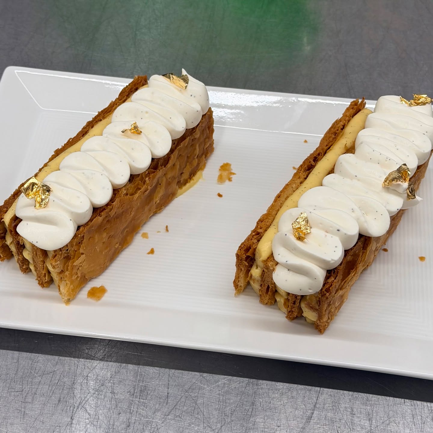 It’s been a very busy baking week in the BU Pastry Arts Program, and I’m just now catching my breath long enough to post. We tackled laminated doughs with Chef Thiago Silva—hello croissants and mille‑feuille—then followed it up with an amazing doughnut class from Chef Hannah Krowne. Cinnamon sugar doughnuts, her prize‑winning dirty chai crullers, and my forever favorite, Boston Cream. Worth every extra pound. 🍩🥐
#BUFoodStudies #PastrySchool #LaminatedDough #MilleFeuille #DonutDay #BostonCream #BakingFromScratch #FuturePastryChef #WorthIt