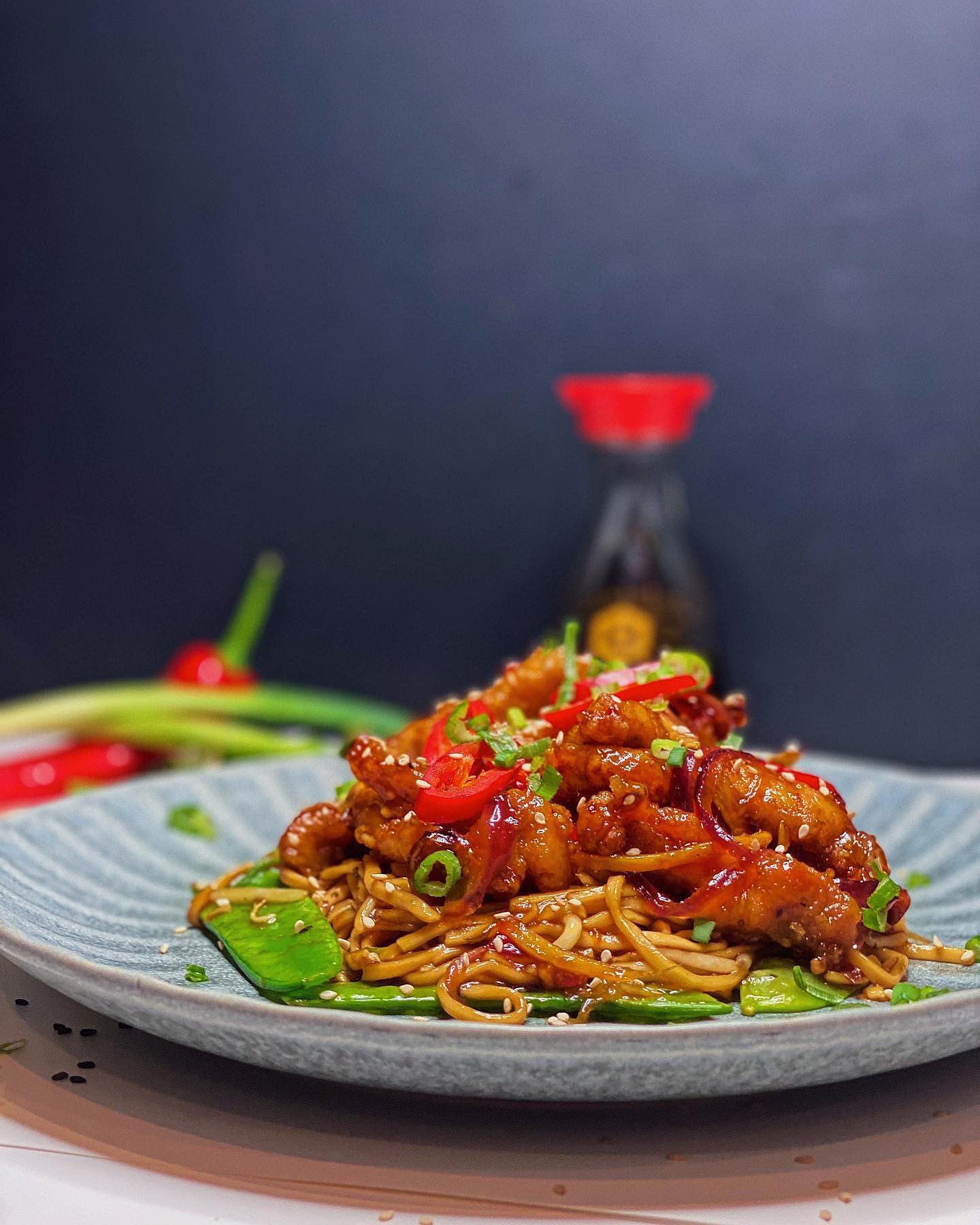 Crispy Spicy Shredded Chicken With Vegetable Chow Mein Noodles 🇨🇳
————————————
1. Begin by marinading for 15 mins: 6 chicken thighs shredded, in 2 tspn sesame oil, 1 tbsp garlic paste, 1 tspn black pepper, and 1 tspn soya sauce.
2. Next, coat the marinaded chicken shreds in 1 cup cornflour, ensuring each chicken shred is fully coated and each piece is seperate.
3. Now, in a wide pan add 100ml sunflower oil and allow to heat before adding your chicken piece by piece. Turn the chicken every so often and allow to cook for around 6 minutes or until golden. (Ensure to cut the biggest piece to check if cooked).
4. Now set the chicken aside as you make the sauce. In a wok, mix 3 tbsp soy sauce, 4 tbsp honey, 2 tbsp sweet chilli, 2 green chillis sliced, 1 tspn sesame oil and some garlic and ginger to taste.
5. Simmer the sauce for 2 mins or until it begins to thicken, then add 1 red onion sliced and 1 bell pepper sliced to the sauce and cook for 2 minutes before adding the chicken.
6. Finally garnish the chicken with some freshly chopped spring onions and sesame seeds.
————————————
If you want the Chow Mein Noodle Recipe please feel free to DM me 😊
————————————
#chicken #chinese #chillichicken #spicy #chilli #roadtofoodofficial #britainsbesthomecooks_ #chowmein #chillichicken #fyp #instagood #instafood #foodbloggers #foodphotography #foodporn #foodie #foodstagram