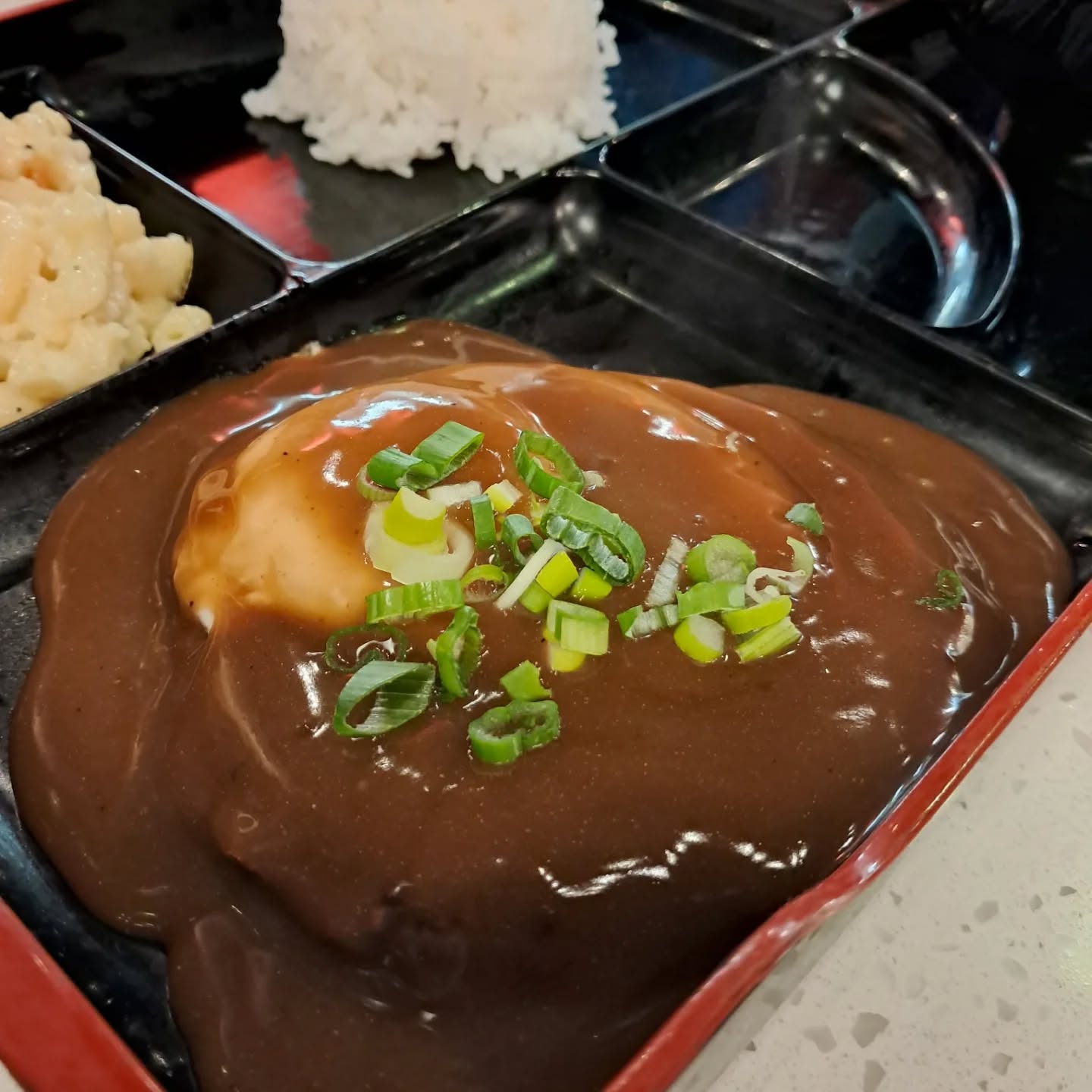 My moco got loco at @bluehawaiifood ! We had the Loco Moco Bento box which came with miso soup, rice, a gyoza and mac salad for about $11. Hamburger, gravy and a runny egg are just kinda magic. And the egg was indeed properly runny.
We also got the Local Style Saimin with hawiian style noodles, spam, bok choy and tamago egg. Lots of noodles to enjoy in this bowl and my chopsticks had plenty to pull from the mild broth.
Happy Faturday all and always remember to Connect With Food!
