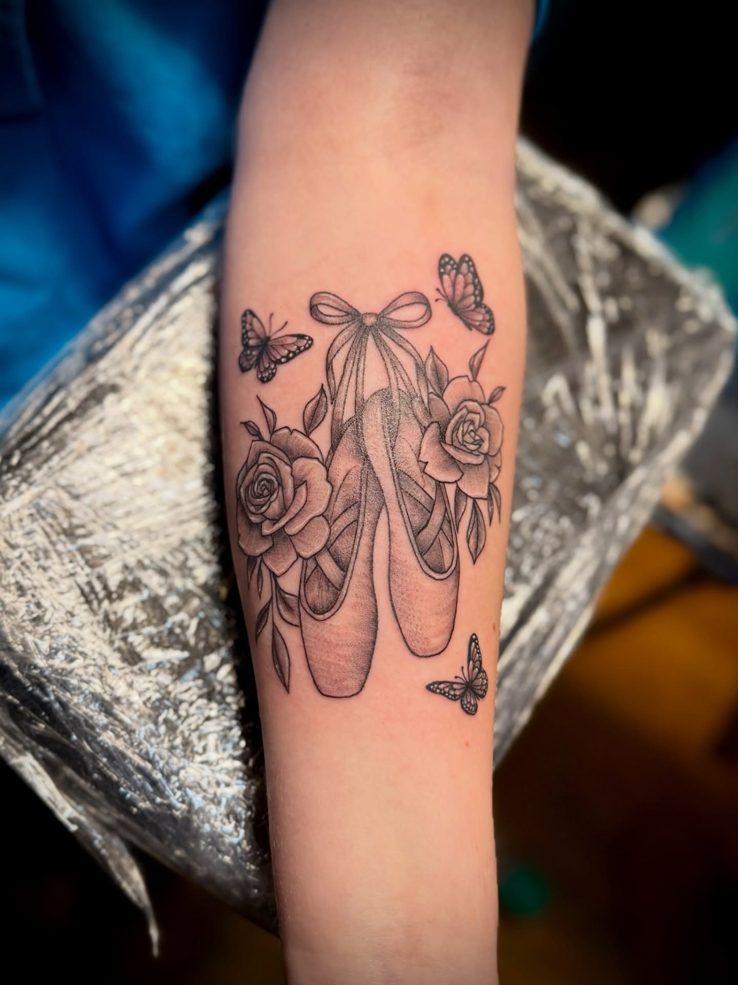 Another first tattoo! Pointe shoes for @makayla15lynn 🌸Done by @kayy.tattoos🩰
.
Book via link in bio
.
.
.
.
.
.
.
.
.
#blackandgreytattoo #daintytattoo #floraltattoo #tattooing #ellsworthmaine