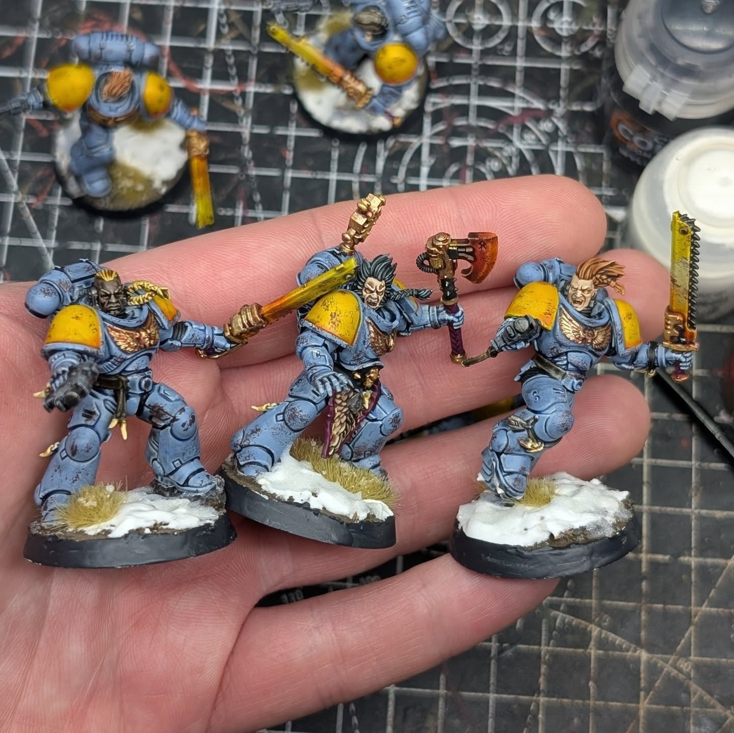 A bunch of blood claws featuring a distinct lack of blood. I'm really glad to be working with blue and yellow, because much like the blood claws distinct lack of blood, my portfolio has featured a distinct lack of blue and yellow. Generally I'll create my own colour schemes, and they just never seem to feature those colours. I'm so sorry to have subconsciously discriminated against them for so long. Here, take my belt and whip me. Whip me good. Whip me blue and yellow. Whip me until there's no longer a distinct lack of blood