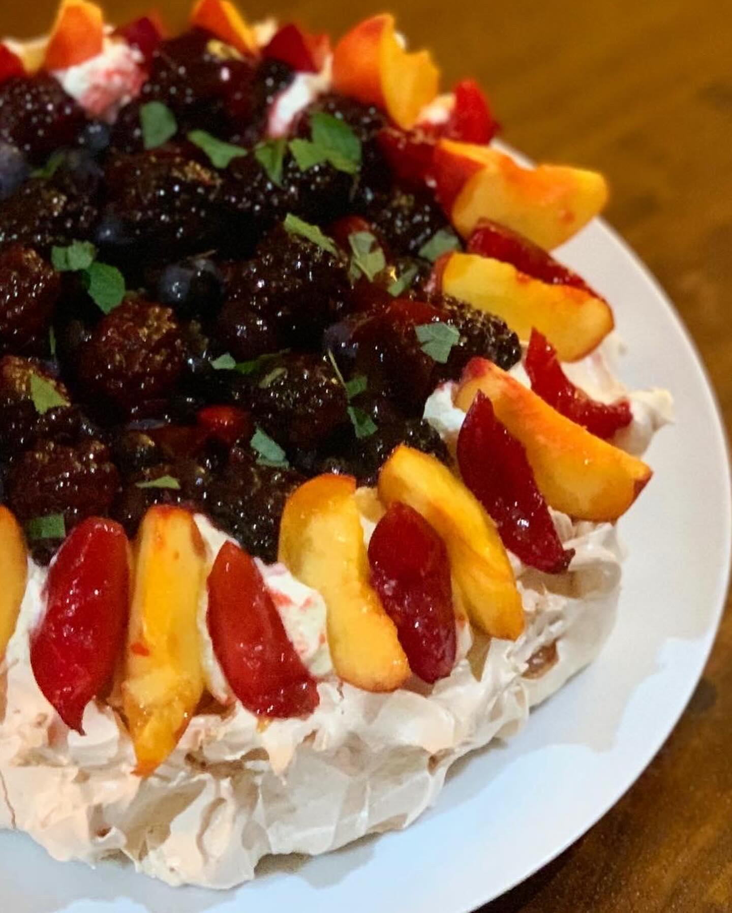 I love a Pavlova ♥️ They are so versatile, easy to make, and filled with whatever you can dream up!! Here it’s a mix of Blackberries, blueberries, peaches, and plums, filled with a vanilla chantilly! #bitingintoahug #bakestagram #bakedgoods #bakedfromscratch #bakedjoy #fromfashiontobaking