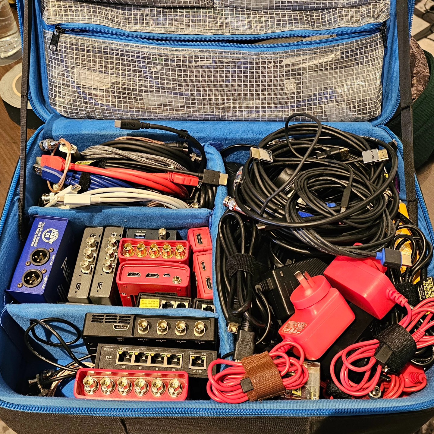 💼 What’s in the Bag: Everything That’s Saved a Show, live production insights.
This is my live production “Oh-Sh*t Bag.”
I wouldn’t step into a live event without it.
It might look like an organised mess, but every item in here has earned its place.
Over years of broadcast and live production, this kit has been built, refined, and battle-tested.
It holds a fix for almost every problem I’ve encountered on the job.
Converters, adaptors, signal testers, patch cables, spare terminals etc
Whether it’s a street sweeper taking out the fibre line, venue internet dropping without warning, tech that won’t talk to each other, AV crew ghosting or gear giving up minutes before going live (usually something associated with HDMI or USBC)
I don’t expect every live event to go exactly to plan. What matters is that the problems never reach the client or their guests. If they don’t even notice something went wrong, then I’ve done my job.
This bag is an insight into how I work: stay calm, stay resourceful, and always build in redundancy. Because behind every seamless show is someone solving problems quietly in the background.
#LiveProduction #BroadcastTools #RedundancyMatters #AVTech #EventProduction #ProblemSolvers #ContingencyPlanning #ProductionLife #videoproductionsydney