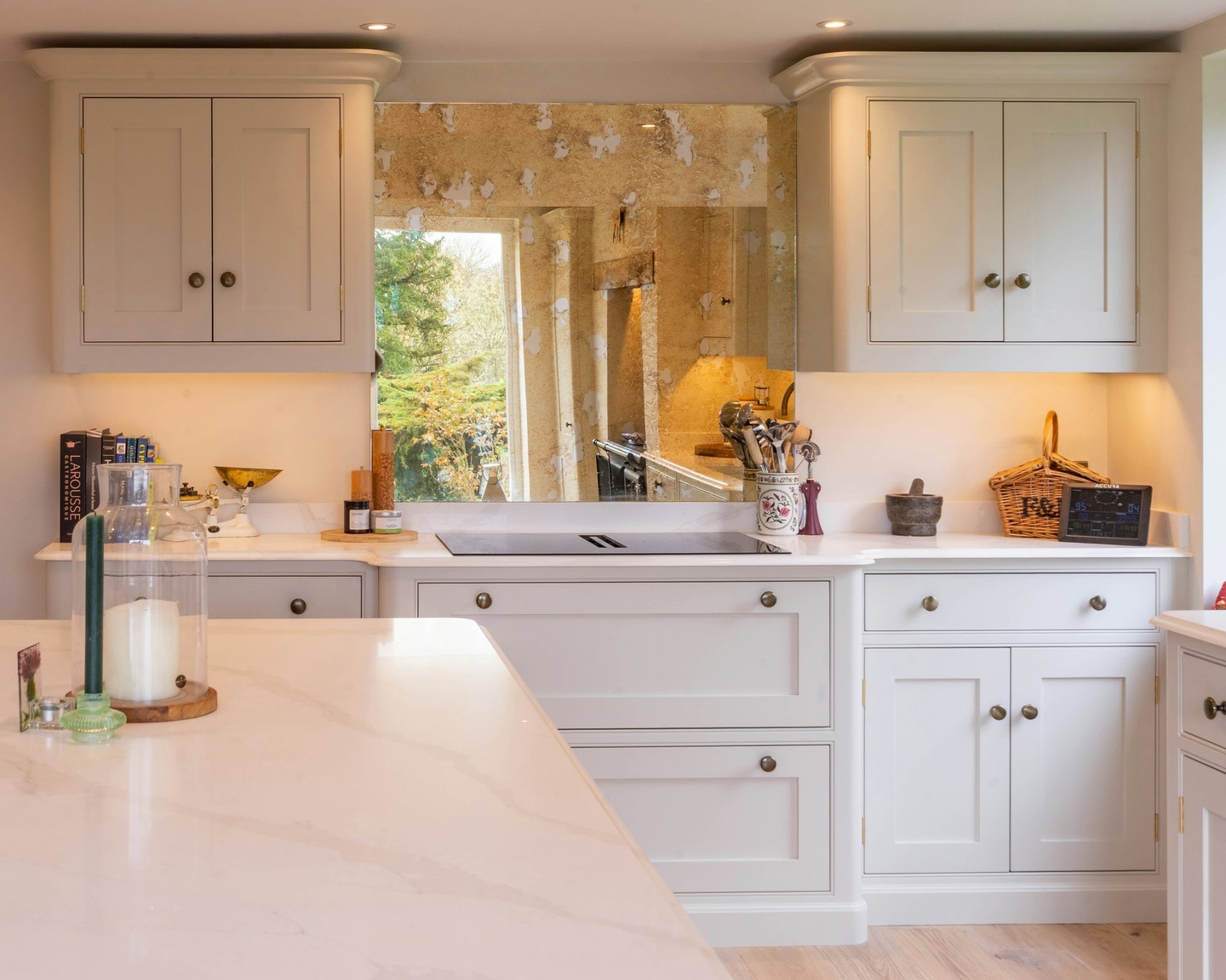 Here, a mirrored backsplash reflects the surrounding light and views, helping the kitchen feel brighter while visually extending the depth of the room. Rather than feeling enclosed, the space gains a subtle connection to what’s around it.
It’s a simple architectural strategy, using reflection to enhance light, create a sense of openness, and make a kitchen feel more spacious. #BespokeDesign #KitchenInspo #InteriorDesign #ModernLiving