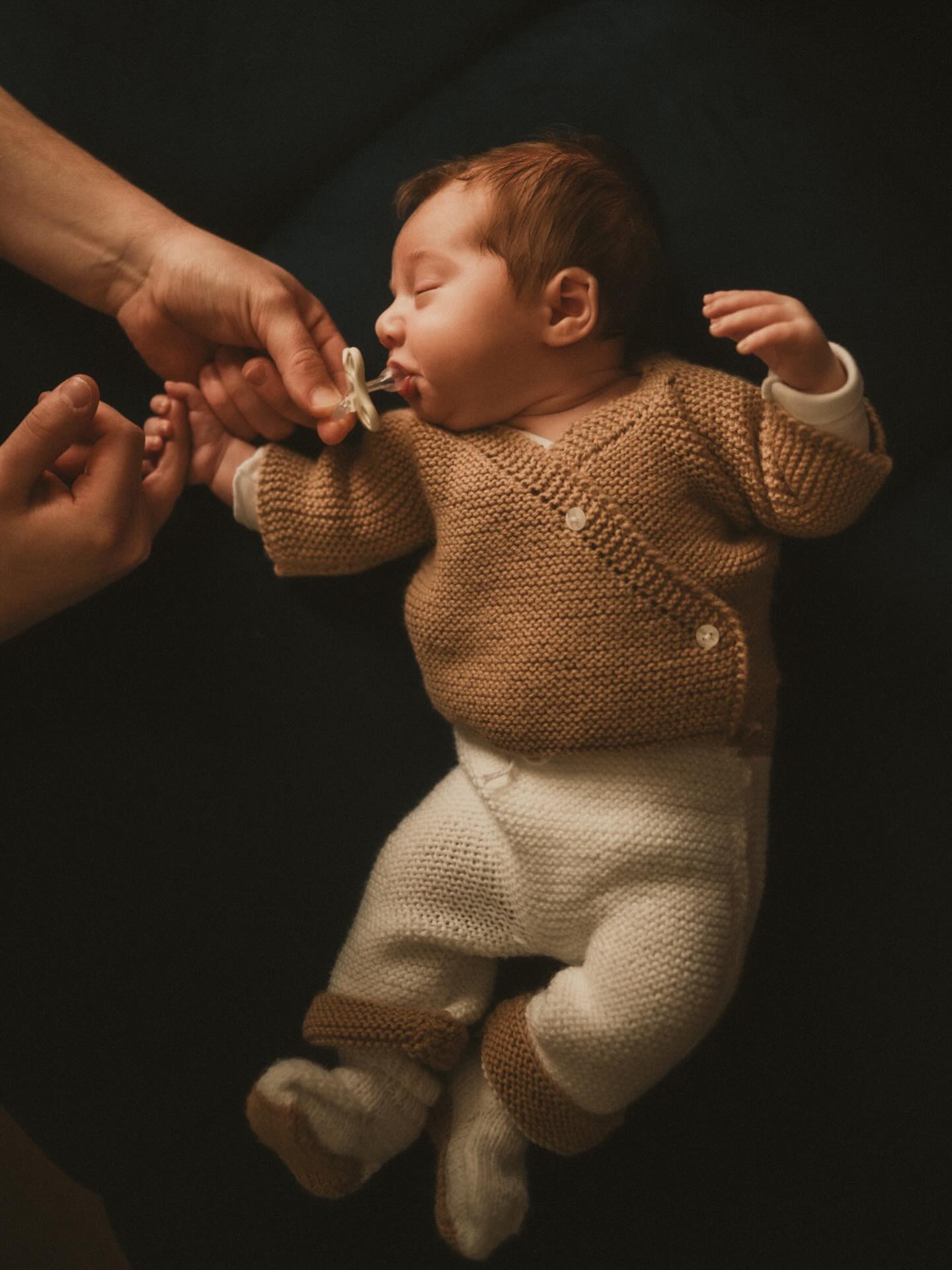 They arrive like morning light
soft, new, and impossibly small,
fingers curling around nothing
and somehow holding all of you.
Days stretch, then fold in on themselves,
a quiet rhythm of firsts
first smile, first laugh, first step
each one gone as soon as it comes.
You blink, and the onesie doesn’t fit,
the crib feels smaller,
their hand slips just a little freer from yours.
Time doesn’t rush
it simply moves, steady and sure,
while you’re busy loving every second.
So hold them a little longer,
trace the softness of their days,
because in their smallness
they give you something vast
a love so delicate, so complete,
it asks for everything
and gives you everything in return.
#photographenice #newbornphotographer #familyphotographer