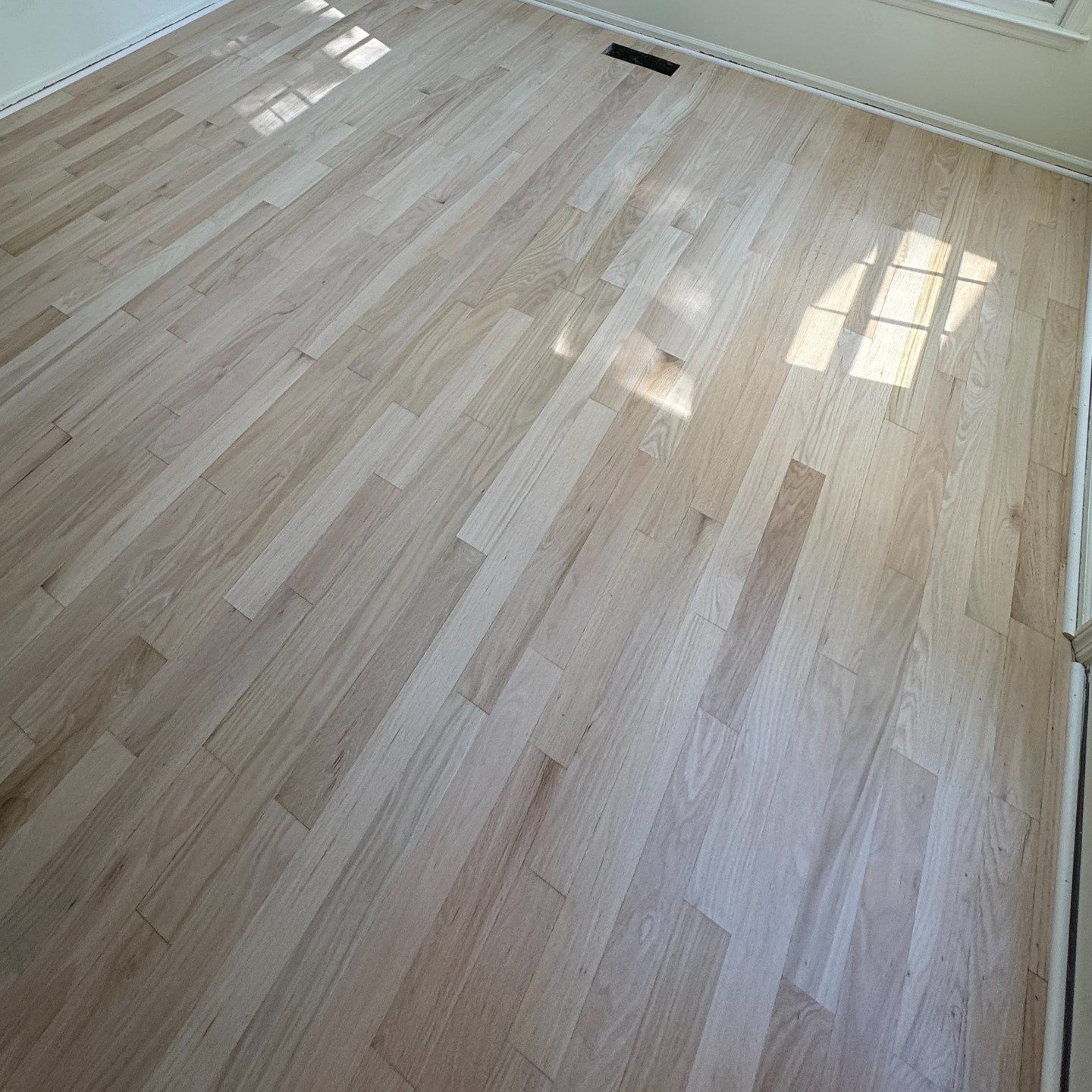 We recently transformed a mix of old and new red oak floors using Bona Red Out, Natural Seal, and Bona HD Traffic, achieving stunning results! Bona Red Out worked its magic by neutralizing the red tones, creating a more modern and cohesive look across the aged and new wood. We sealed the floors with Bona Natural Seal, enhancing the wood’s natural beauty, and finished with two coats of Bona HD Traffic for exceptional durability and a flawless matte finish. The transformation left our customer thrilled with the seamless and updated appearance of their floors! #BonaRedOut #NaturalSeal #BonaHDTraffic #FloorRefinishing #StunningResults #HappyCustomer #thehardwoodguys