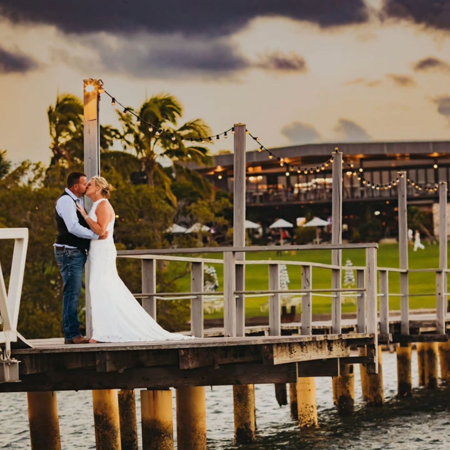 Sheree and Brendon might just have one of my all time favourite stories.
I tell everyone who will listen about it!
It started with a house. Sheree owned a home in Hollywood Close - lovingly referred to as “Hollywood”. When she put it up for sale, the neighbour across the road kept a close eye on who came through. She reported back that a good-looking young guy had been checking it out. That good-looking young guy was Brendon, and he ended up buying the house. Sheree only caught a brief glimpse of him at the final inspection while she was busy moving out, and at the time, she didn’t think much of it.
What Brendon didn’t realise was that when he bought Hollywood, he was getting more than bricks and mortar. Less than 18 months later, Sheree came with it. They had mutual friends through the neighbours, and after a messy night in February 2013, after being kicked out of the Bradford, Brendon wandered home and found the neighbours chatting to Sheree on the phone from their verandah. A few cheeky, slightly inappropriate drunken comments were made, and the next morning, Brendon sent Sheree a message on Facebook apologising. They haven’t stopped messaging since.
How amazing is it that she ended up moving back into the house she sold 🤣🥰
@sandstonepointweddings
@lauren__aberle