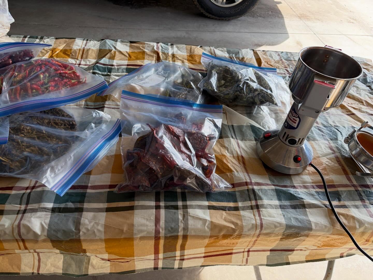 I’m grinding smoked garlic, smoked garlic scapes, smoked paprika, green hot peppers, red hot peppers and superhot peppers today. #spicefarm #mnspice #homegrowngarlic #garlicscapes #smokedpaprika