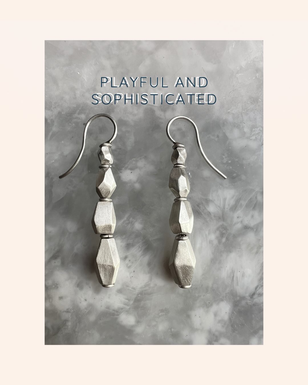The Facet Play Dangle Earrings turn movement into an artform. Each earring is composed of four hand-filed faceted beads graduating from small to large, strung on sterling silver chain to create a fluid, almost snake-like sway. The chain allows every bead to glide and breathe, with a hand-forged jump ring between each one to give the design subtle air and soft articulation.
✨
Finished with hand-forged ear hooks and secured with solid gold connections for lasting strength, these earrings offer a mesmerizing, kinetic feel. The satin-finished silver beads catch light on every facet, creating quiet sparkle with each motion. Elegant, sculptural, and endlessly touchable, they’re the pair you’ll find yourself reaching for and fidgeting with all day long. Find them at mejiajewelry.com
✨
Message me with questions.
✨
✨#mejiajewelry #handcraftedearrings #oneofakindearrings #madeinnewyork #longislandjewelry