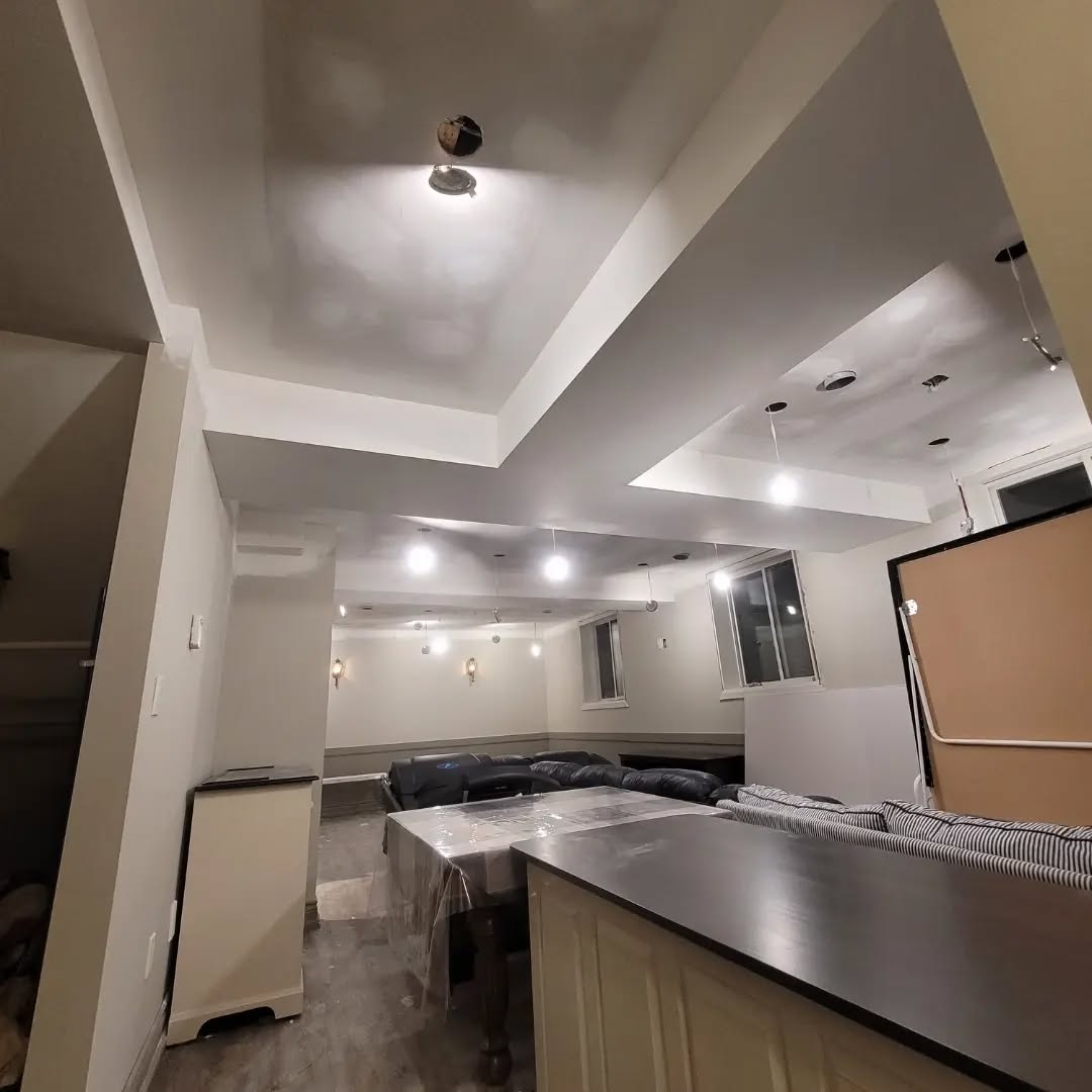 New drywall ceiling install, with evenly spaced pot lights. Completed by Maximus Craftsmanship