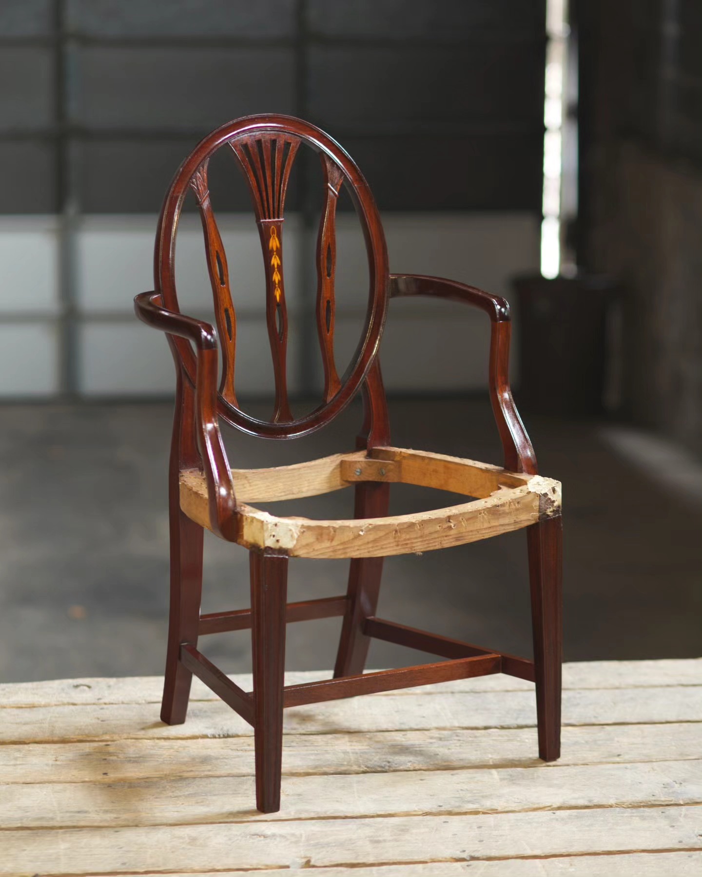 Crackly old finish, be gone! Now you can really see the wood and the inlaid bellflowers.
#furniturerestoration #furniturerestorer #marylandfurniture #mahogany #mahoganychair #ovalbackchair #shellac #shellacfinish #frenchpolish #frenchpolisher #restoredinbaltimore