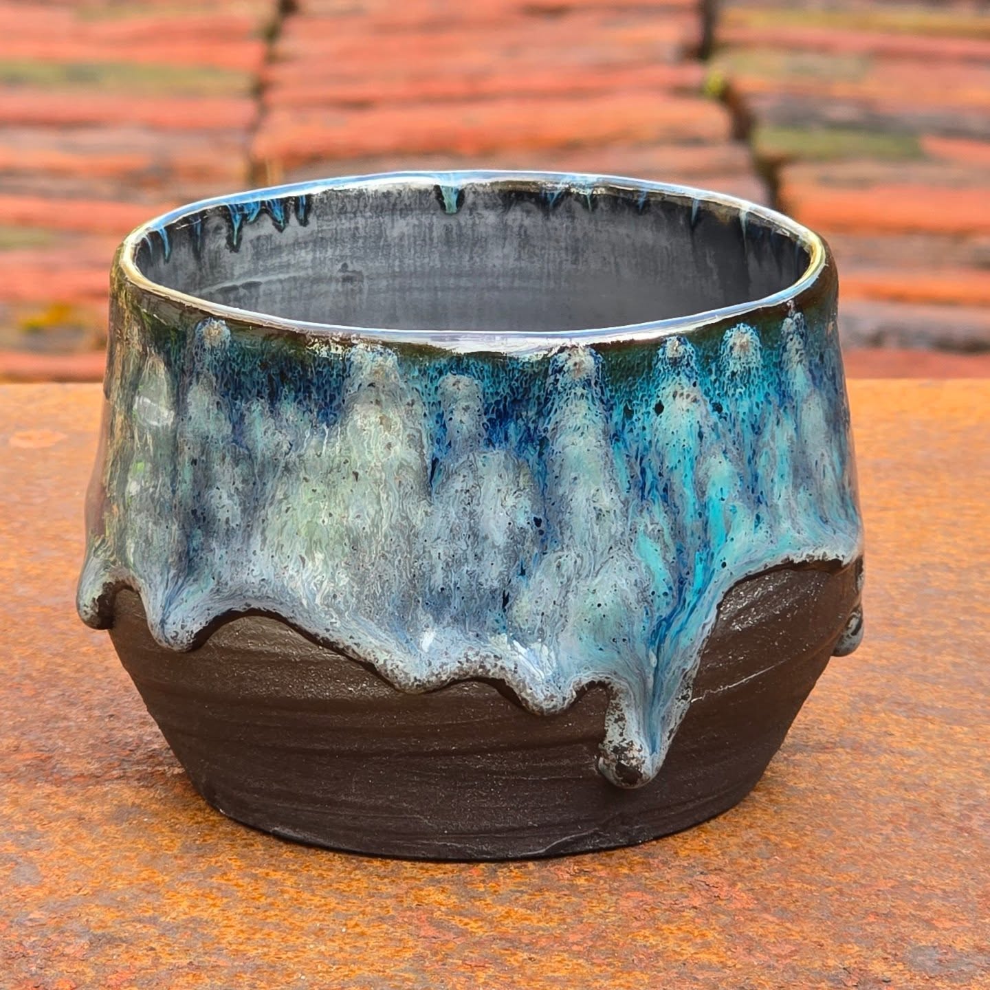 Small tea bowl. I absolutely love this black clay, it plays surprisingly well with most glazes.