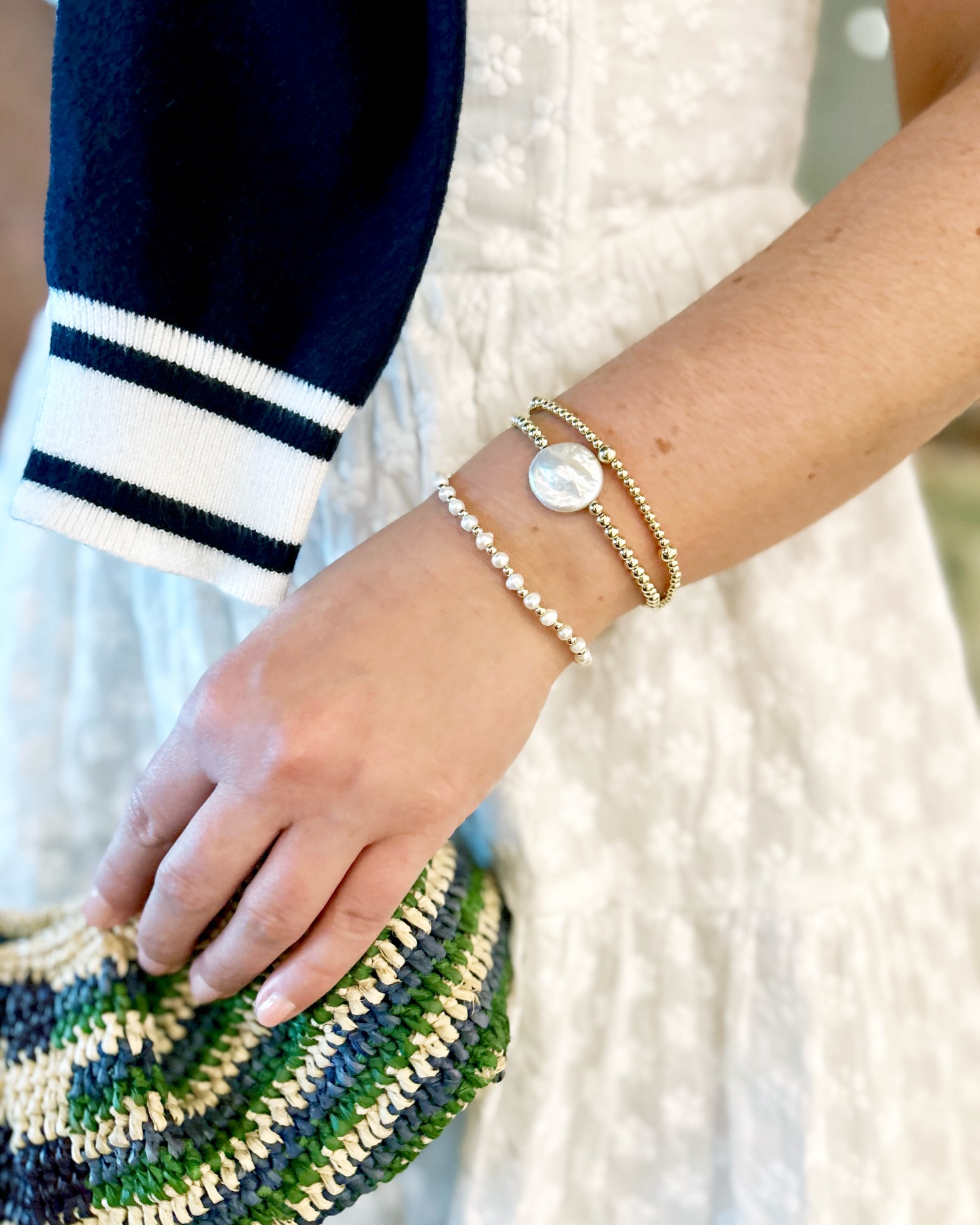 Easter chic / ready to play 🤍✨
Elley in pearl + Anna coin + Poppy
Waterproof, one size fits everyone & ready to live in!
Woman-owned | Handmade jewelry | 14k gold filled | Pearly stackable bracelets | nauti sweater @woodees_boutique, cutest white dress @christinaltdstore, raffia bag @theshoehive