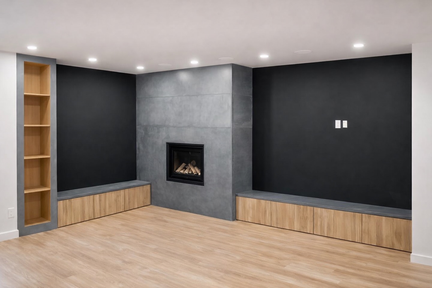 A basement, redefined.
This feature wall was designed to transform a previously underutilized space into something architectural, grounded, and intentional. At the centre, a custom concrete fireplace surround anchors the room with a quiet, sculptural presence — minimal, but deeply textured.
Flanked by integrated walnut bench seating, the warmth of natural wood softens the composition, creating a balance between raw materiality and refined living. The contrast of deep matte walls against the concrete surface adds depth, while the built-in storage and open shelving bring both function and flow to the space.
Every element was considered — from proportion and symmetry to material transitions — resulting in a space that feels cohesive, elevated, and effortlessly livable.
This is what happens when utility meets design.
—
Designed & fabricated by CreteSTRÖM
#CustomConcrete
#FireplaceDesign
#LuxuryInteriors
#ModernHomeDesign
#BuiltInDesign