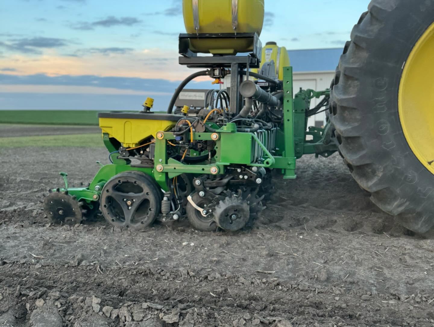 Plot planter got some acres on it this week, new racking for more harnessing and liquid hose. And those beans are close to breaking through! Now we just need a good week of planting weather!