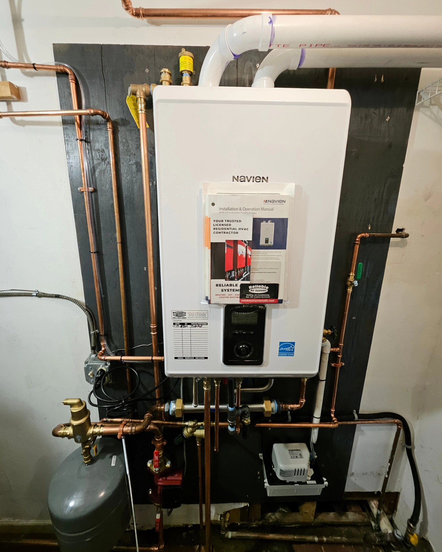 SATURDAY MADNESS. A good customer of ours old gas boiler crapped out on them, leaving them with no heat. It was old and needed to go. They decided to go with a Navien Combi boiler instead of throwing money into a 27 year old boiler. We took the old water heater and old gas boiler and put it into one tankless unit and opened up what was already a small space. Call us today to speak to one of our experts about upgrading your old system! 203-305-6453