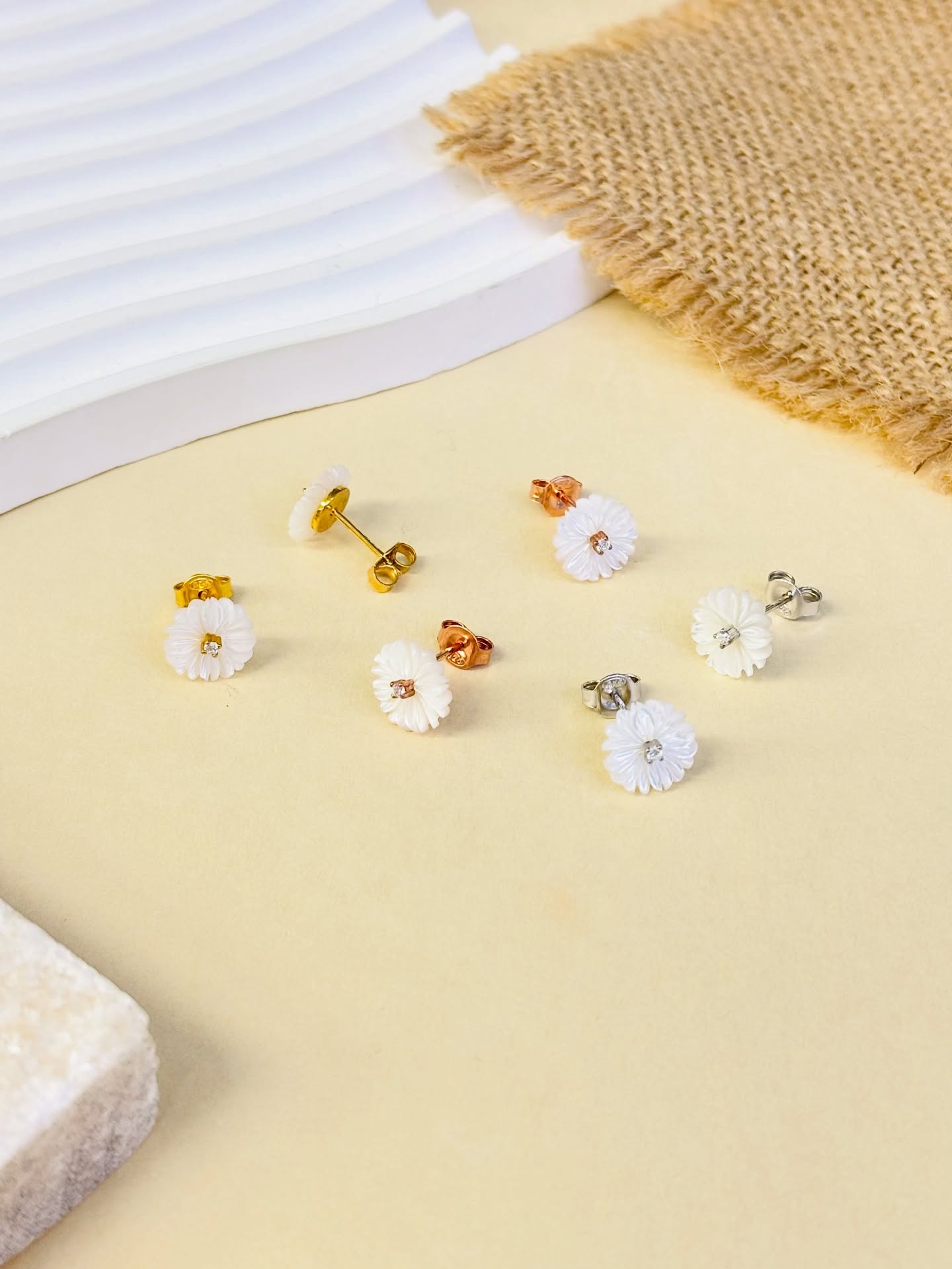 925 silver MOP (Mother of Pearl) flower earrings available in various designs.