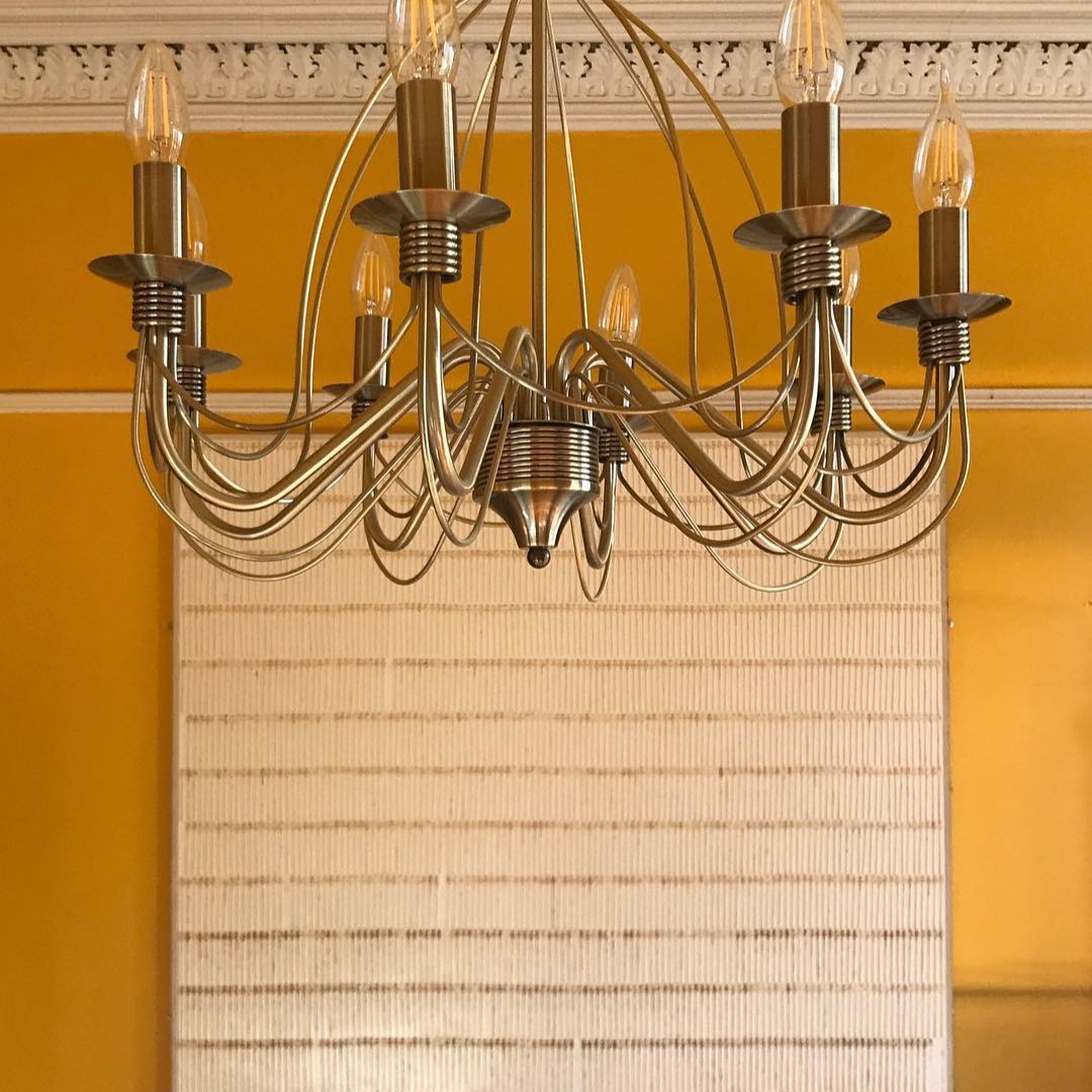 This piece of artwork was made using coffee stirrers and hangs on the wall of one of my client's homes. Isn't it fantastic?! And the colour on the wall is like summer and just joyous! I love colourful interiors 💖