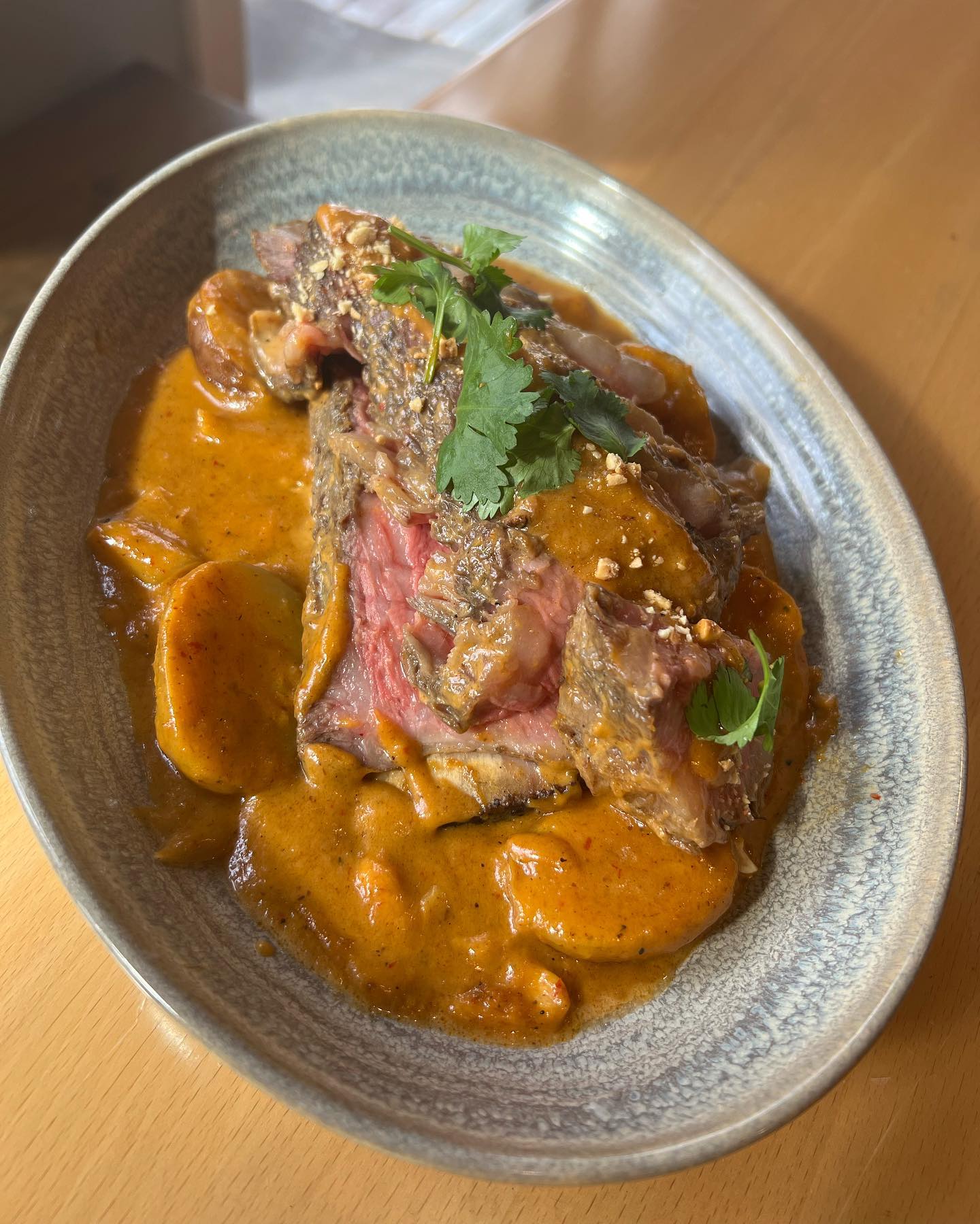 We are so excited to share our family’s recipes with you! This is our Short Rib Massaman, consider this a Thai style steak and potatoes. The short rib has been cooked to perfection in an incredibly rich country curry. This dish has comforting familial vibes and makes you wanna curl up next to a cozy fire after cleaning your plate.
We just launched all of our seasonal specials and we don’t want you to miss it!
#seattlerestaurants #seattleeats #thaifood #seattlefood #fremontseattle #centeroftheuniverse #familyowned #immigrantowned #womenownedbusiness #seattlerestaurantweek