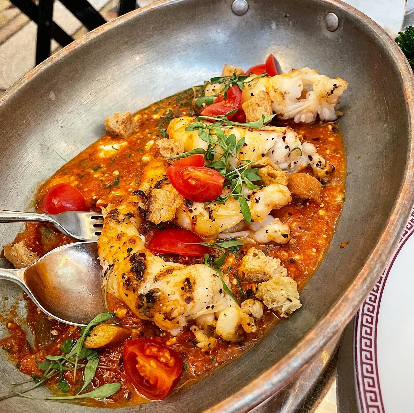 The most sensational meal from @bacchanalialdn - Shrimp Saganaki and chocolate and pistachio choux buns ✨