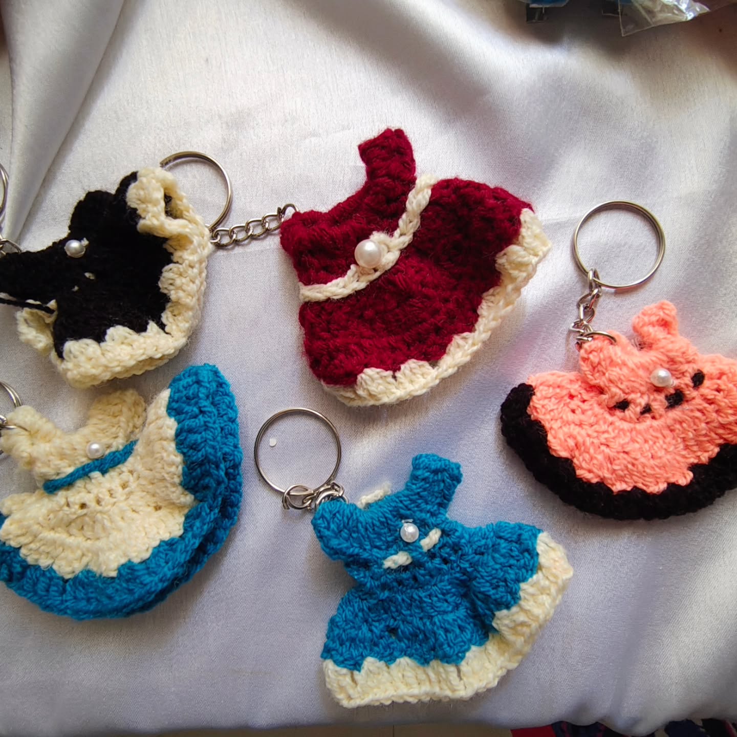Crochet crafts available in different designs frock,heart,hat,rose