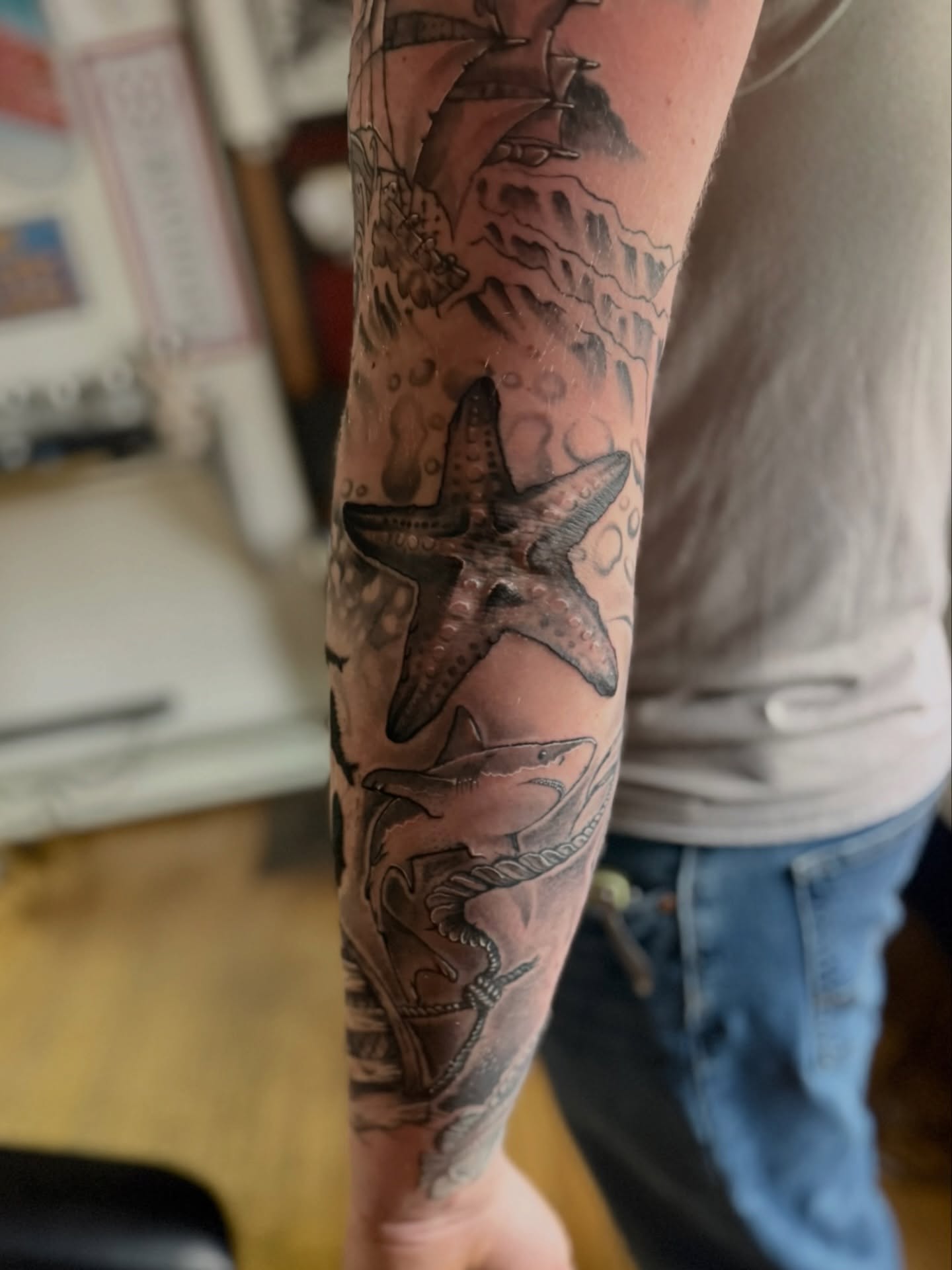 Part 2! A sweet elbow-starfish to complete an ongoing nautical sleeve 🐟 Done by @dfd.james.tattoos
.
Book via link in bio
.
.
.
.
.
.
.
.
.
#nauticaltattoo #blackandgreytattoo #oceantattoo #elbowtattoo #ellsworthmaine