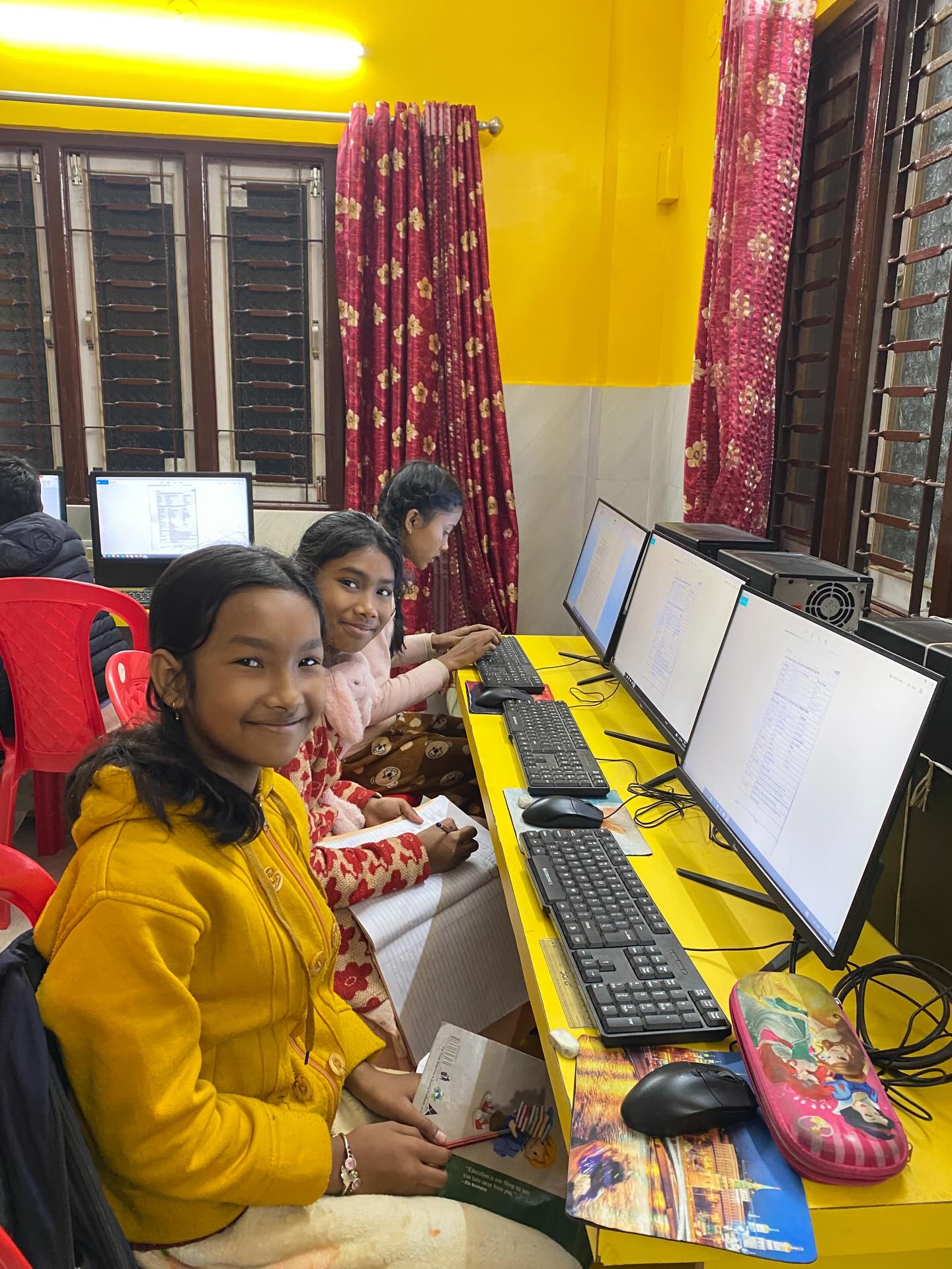 Enter our classroom in Naxalbari, India, where students are learning how to type and use applications like MS Word and Excel. We currently have 23 computers between our two classrooms in Kolkata & Naxalbari, and have plans to expand this much more in the near future. We want to mention again that students often don’t get to see a computer before 10th grade here. Typing, personal paragraph writing, graphing, creative writing, and learning to use the computer are critical foundational skills. Every student deserves a chance to see a computer and learn how to use one.
#goldenwings #computerclass #education #india #naxalbari
{school, education nonprofit, typing class, youth education, youth empowerment, computer class, West Bengal, India}