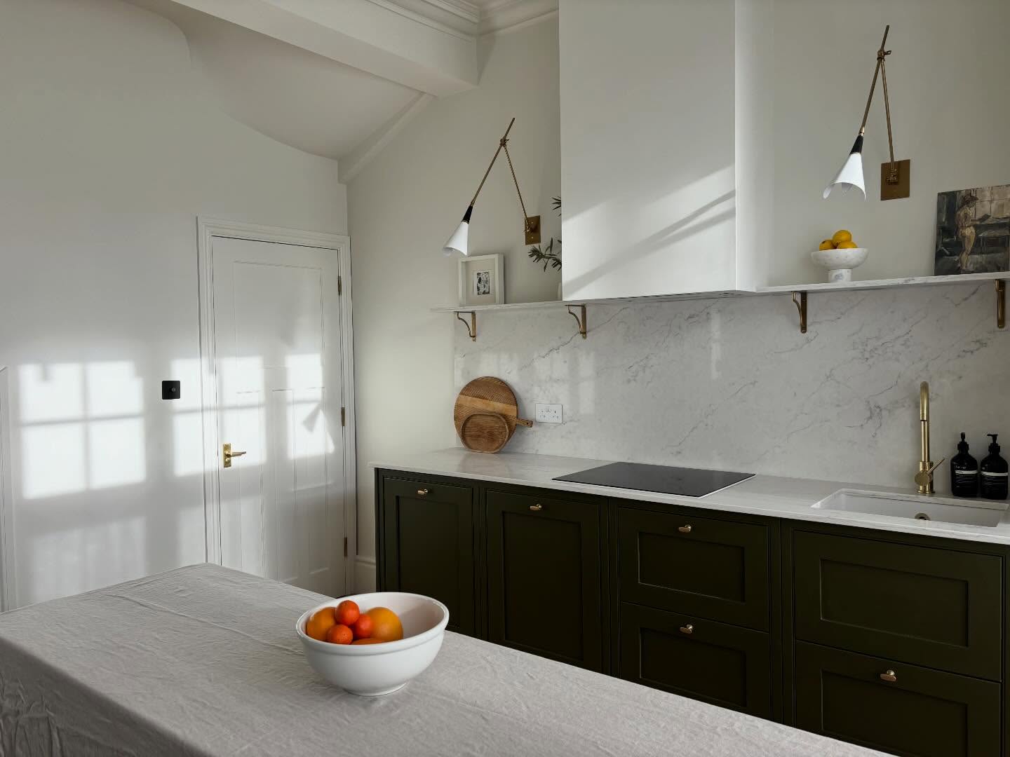 Swipe for some before and afters at our Wimbledon project, London. We reduced the kitchen unit run a little so that we could add a much-needed ground floor wc in the space under the stairs. We focussed tall units along one wall to maximise storage whilst keeping the opposite side low and open with a bespoke hidden cutlery drawer under the hob. Radiators were removed in favour of more efficient underfloor heating and a new engineered oak parquet installed. The whole space works much better and feels much lighter and more open for our senior client.