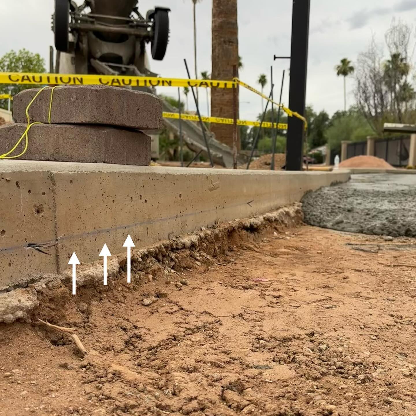 How to know not to exceed a certain measurement when pouring concrete? Our guys have it all figured out. Preparing the site in advance for the concrete pour. That Blue line is their guide on this project