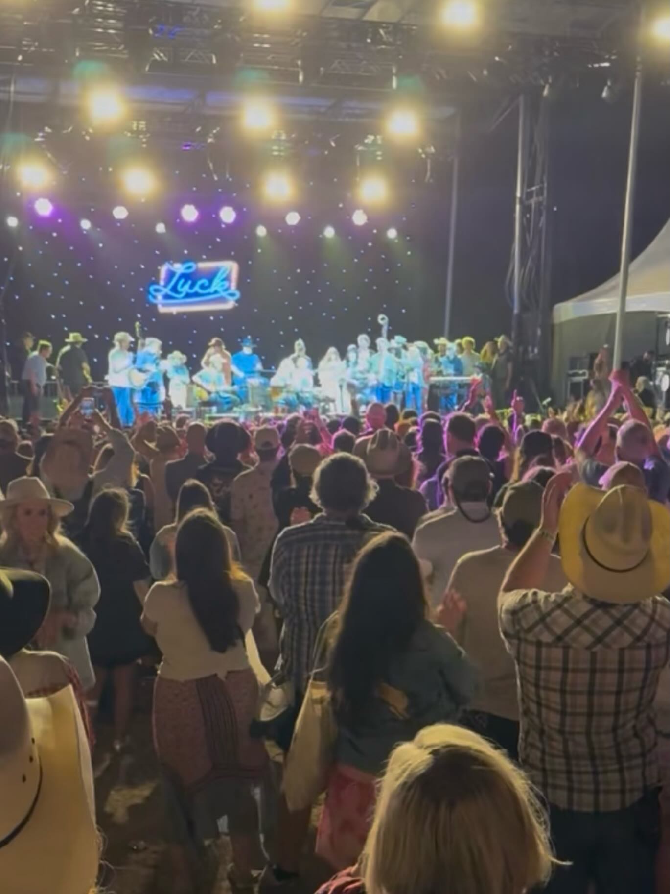 My wife, Stacy @butterflies_rainbows and I ( far right ) on stage with @willienelsonofficial the other night to close out @luckreunion singing “Lord It’s Hard to be Humble” and a medley of gospel tunes including “Will the Circle Be Ubroken,” “I’ll Fly Away,” and “I Saw the Light”
This is a still from a video that my dad took from the crowd, not realizing we were on stage at the time
🙏🏼Thanks again to the the Luck family and my old pal @mattbizer for having us out 🤙