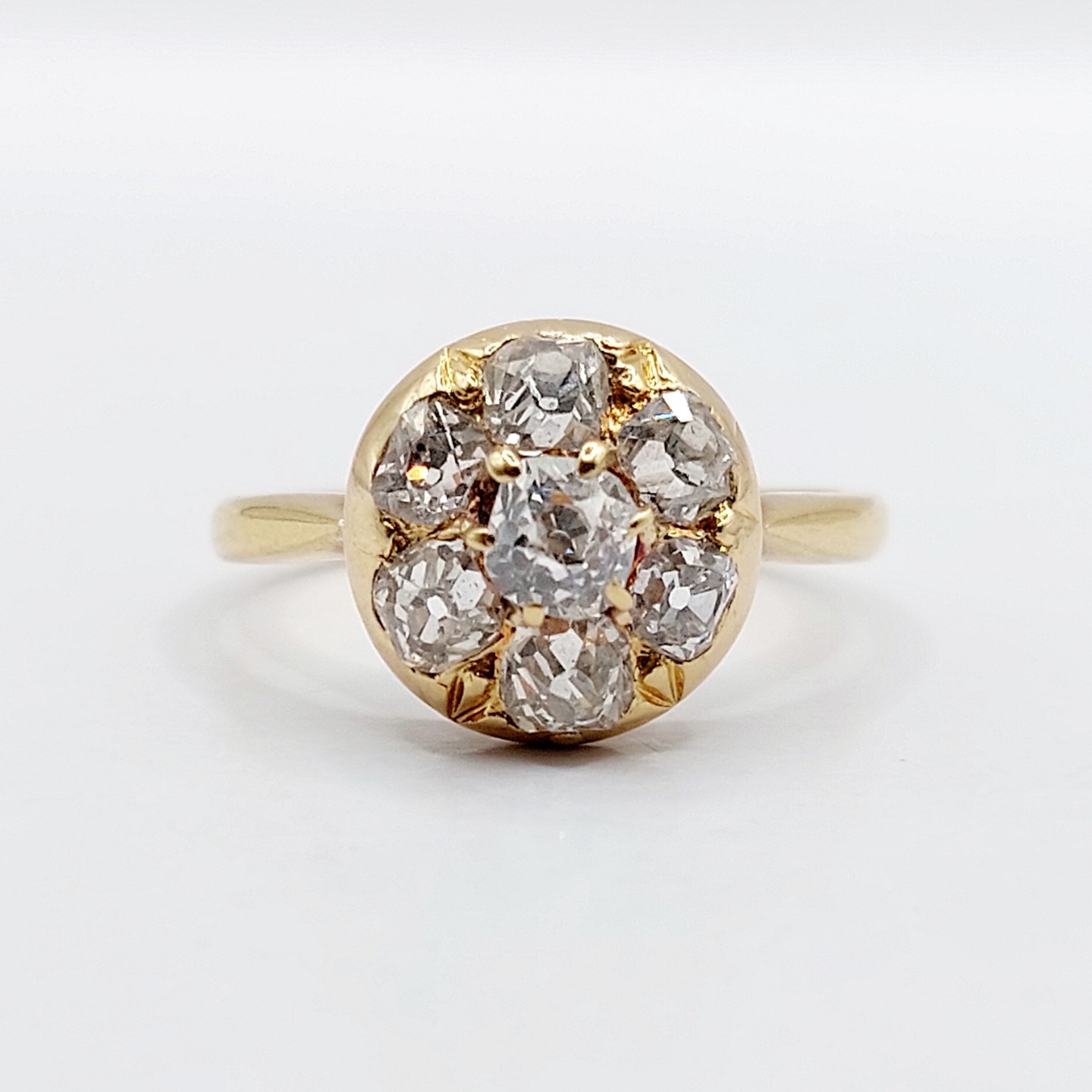 /// SOLD \\\ French Antique daisy ring 18k gold set with a 1.25 carat of old mine cut diamonds (circa 1900)
PRICE : 1400€
Magnificent piece of late 19th-century French goldsmithing work
Size: 55.5 FR / 7.25 US
Weight: 3.73 g
Main diamond size: approximately 4.0 x 3.8 x 3 mm (estimated at 0.30 carats)
Secondary diamond size (x6): approximately 3.5 to 3.0 mm (estimated at 0.95 carats total)
The diamonds are white, in good overall condition (a small scratche on the central diamond and a small chip on a secondary diamond), with few inclusions visible under magnification
Head size: 11.3 mm
Micro scratches from use
Eagle's head hallmark and partial maker's mark (French hallmarks)
#frenchjewelry #diamond #diamondring #antiquering #victorian #victorianring #marquisering #augustusjewels #vintagering #daisyring #daimondhaloring #oldminecut #oldminecutdiamond