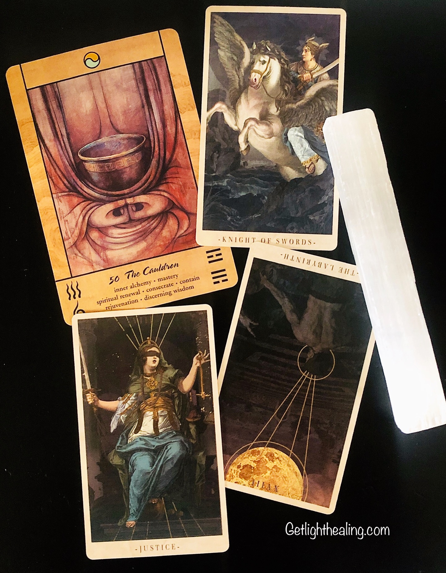 Guidance for week of April 12th, 2026: “ “Alchemist Transforms Pain into Meaning”
The Cauldron: An inner process of purification, alchemy, and finally integration — the restoration and reconstruction phase after breakdown, revolution, or uncomfortable change. Once the lies and the artificial fall away, you can start fresh. A clean container, ready to receive your hopes, dreams, and prayers, from which new inner foundations can be built to sustain and nurture you. Seeing the truth of this process will help restore balance — but it will not feel good at first.
Justice asks you to make the conscious decision to descend into the Underworld and confront exactly the things you least want to look at. A bitter reality to face, yes — one that requires bravery but carries potentially empowering long-term impact. This Knight ventures into dangerous territory — a shadowy labyrinth where everything looks distorted. You have built elaborate structures around your messy secrets, untruths, and doubts. This reversal asks why you seek to keep them protected. To adequately deal with an issue you must see it for what it really is — warts and all. Sunlight is the greatest disinfectant. You know intuitively that holding back on this process will limit your ascent — clip the wings of Pegasus, so to speak. The energy you wish to gather and sustain yourself with must not be tainted by grime or willful blindness. Must you not have a clean pot before cooking the food you wish to eat? Allow these repressed things — unhealthy patterns, reactions, fears — to rise, be acknowledged, released, and finally cleansed. As they do, their hold begins to dissolve. Confidence grows. Enter Pegasus — notoriously wild and free, finally tamed by Bellerophon. A symbol of freedom and transcendence, this Greek hero accomplished that feat only through the help of Athena, Goddess of Wisdom and Justice. The Sword of Truth cuts through the BS, finds the truth within, and cuts it free despite the initial discomfort. In this regard the Knight is truly a spiritual warrior — braving the descent into the Shadow, rising from the depths of its waters, emerging lighter and with greater clarity.