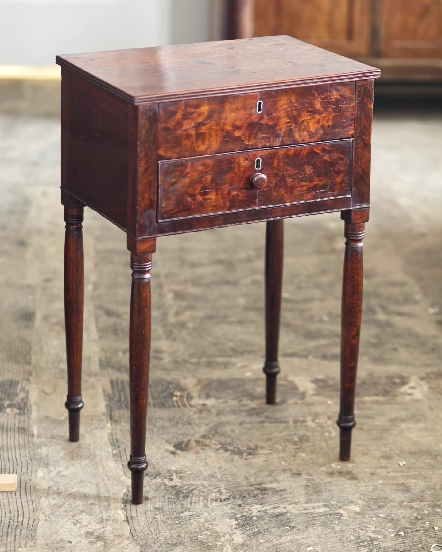 I wish I could retrieve the 'before' photos from my dead phone of this little table. They'd show surface dirt and texture (particularly on the legs) as well as some damage to the hinged top (pro tip: always make sure your hinge screws are shorter in height than the board you are screwing them into) and some missing beading around the bottom of the case.
Now, the table is all cleaned up but still retains lots of character (and in some places, texture) even after a light French polish. It's a treatment that delivers a look I'm partial to: old, but well maintained.
#furniturerestoration #furniturerepair #furniturerestorer #mahogany #mahoganyendtable #mahoganyworktable #johnneedles #frenchpolish #frenchpolisher #restoredinbaltimore