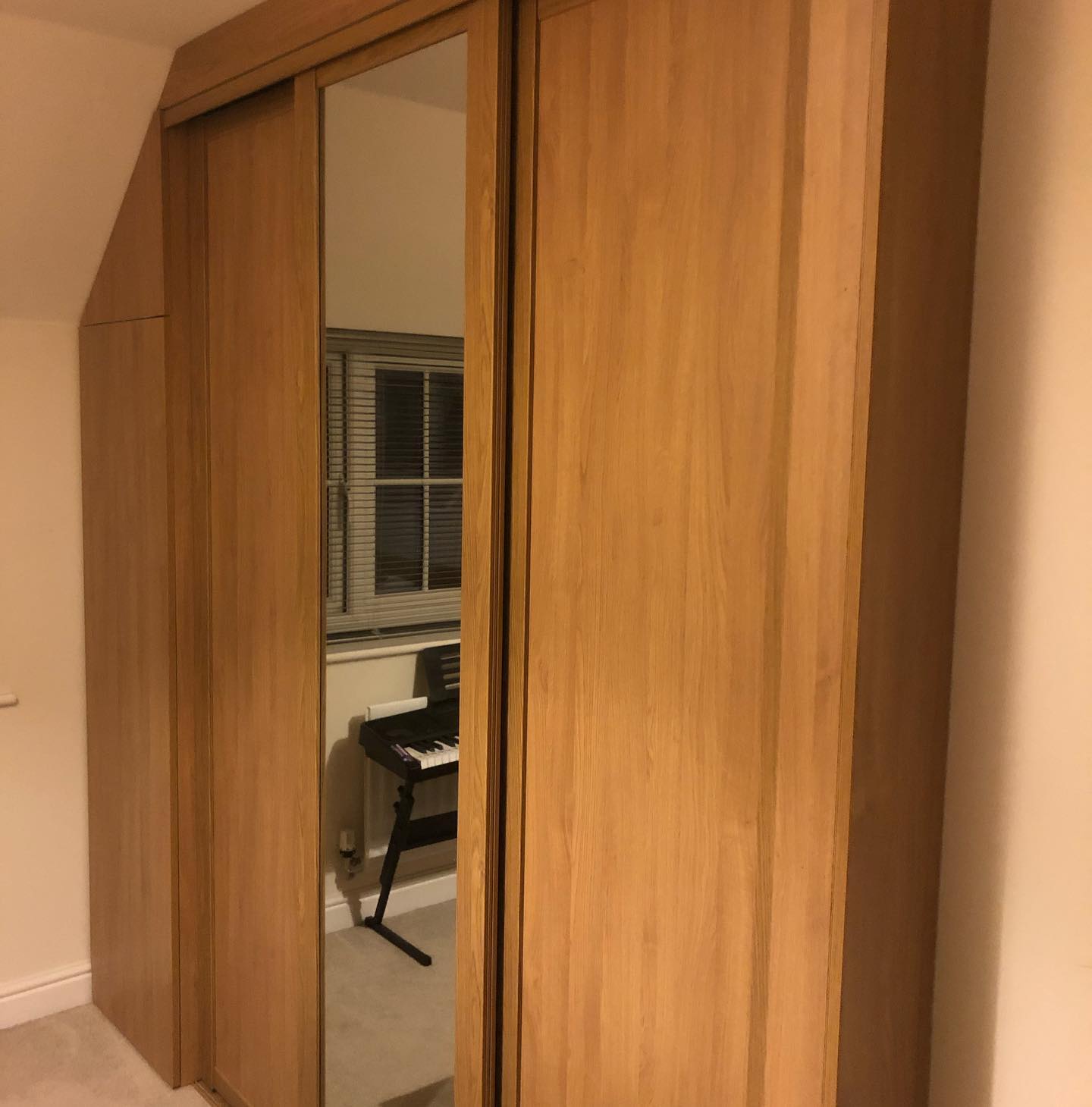 Sliding wardrobe doors installed to turn the customers clothing rails into an encased unit. #BrenBuilding