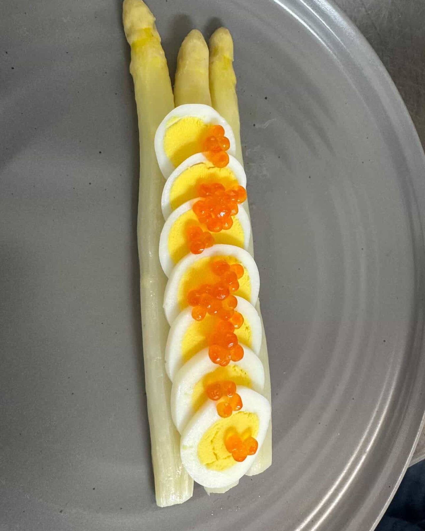Amazing chef @chefgillesepie inside @huntvalleycountryclub creating unique asparagus salmon roe dish #french#lax#frenchchef#