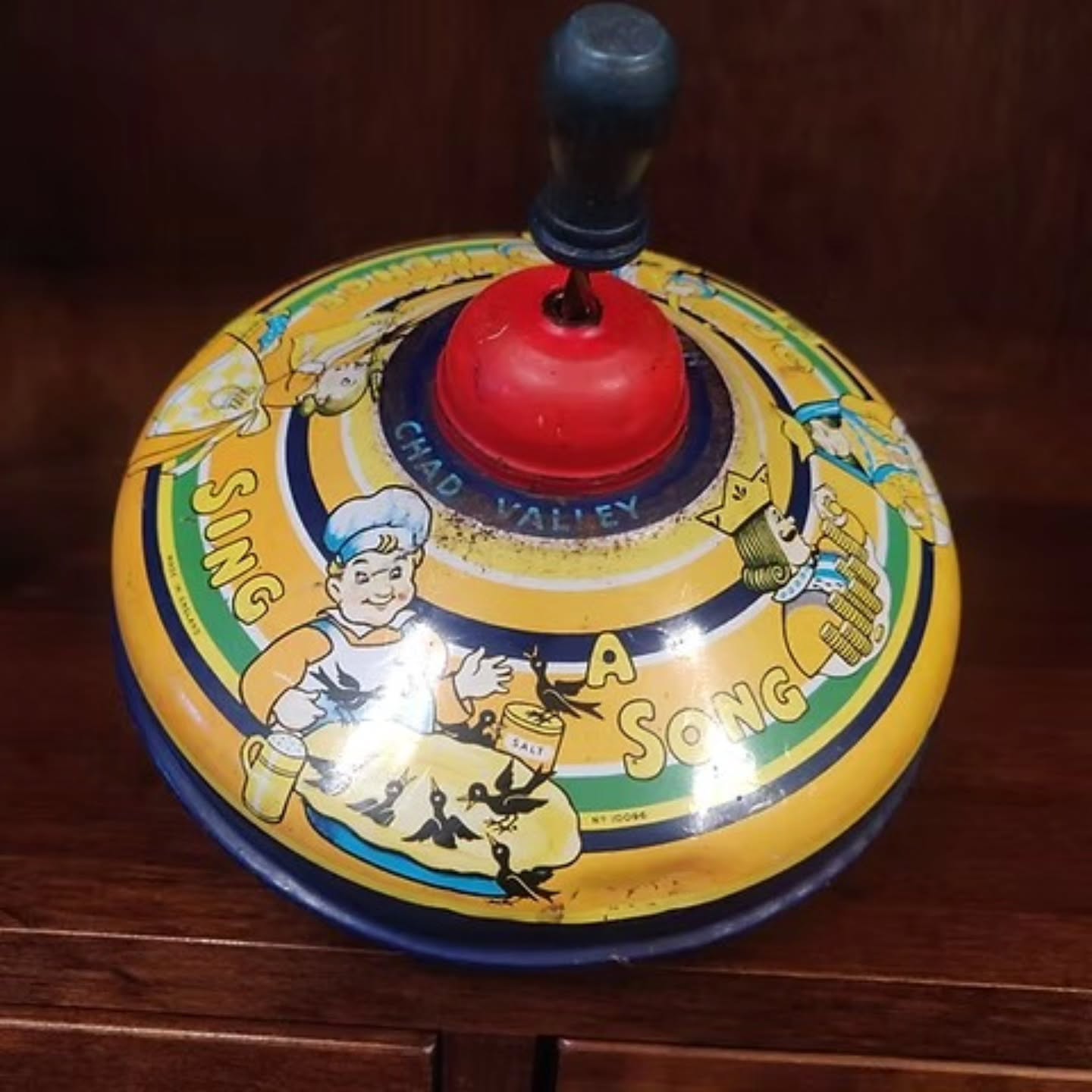 Vintage 1950s Chad valley spinning top | https://share.google/BF0HIRMJmrLo7rSPP #stufftoyouandme