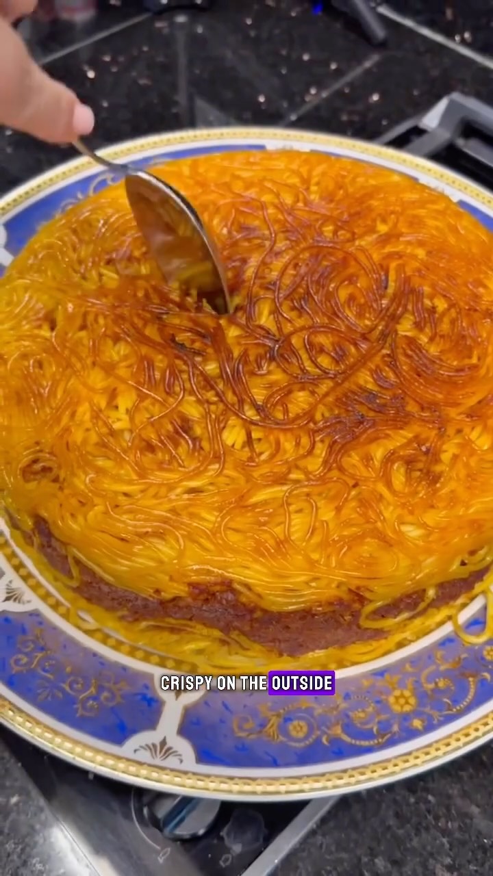 Macaroni ~ Persian Style Spaghetti ⬇️⬇️⬇️ RECIPE BELOW
Ingredients:
• 600g minced beef
• 3 ½ teaspoons salt (divided)
• 1 teaspoon pepper
• 1 teaspoon turmeric
• 1 teaspoon cinnamon
• A few strands of saffron
• 1 small onion, chopped
• 3 cloves garlic, minced
• 4 tablespoons tomato paste
• 700g jar of passata (tomato puree)
• 600g spaghetti
• 5 tablespoons oil (divided)
Instructions:
In a large pan, heat 2 tablespoons of oil over medium heat. Add the chopped onion and sauté until soft and golden.
Add the minced garlic to the onions and cook until fragrant and slightly golden.
Add the minced beef to the pan and cook, breaking it apart, until browned.
Stir in the tomato paste, 1 ½ teaspoons of salt, pepper, turmeric, and cinnamon. Mix well to combine.
Add the saffron (soaked in a bit of hot water if needed) to the meat mixture, then pour in the passata. Stir and let the sauce simmer for 1 hour on low heat, allowing the flavors to meld.
In a separate pot, bring water to a boil, adding 2 teaspoons of salt. Add the spaghetti and cook according to package instructions (about 8 minutes for al dente). Drain the pasta and set aside.
In a large pan, heat the remaining 3 tablespoons of oil over medium heat. Start layering the cooked spaghetti and the meat mixture, alternating between layers of spaghetti and meat, finishing with a final layer of spaghetti. Press down gently.
Let the layers cook on medium heat for 45 minutes to create a crispy bottom layer. Carefully flip the pan onto a plate to reveal the crispy, golden crust.
Serve hot and enjoy your delicious Persian-style macaroni!
#macaroni #persianspagetti #tadiglover #persianfood #persiancuisine