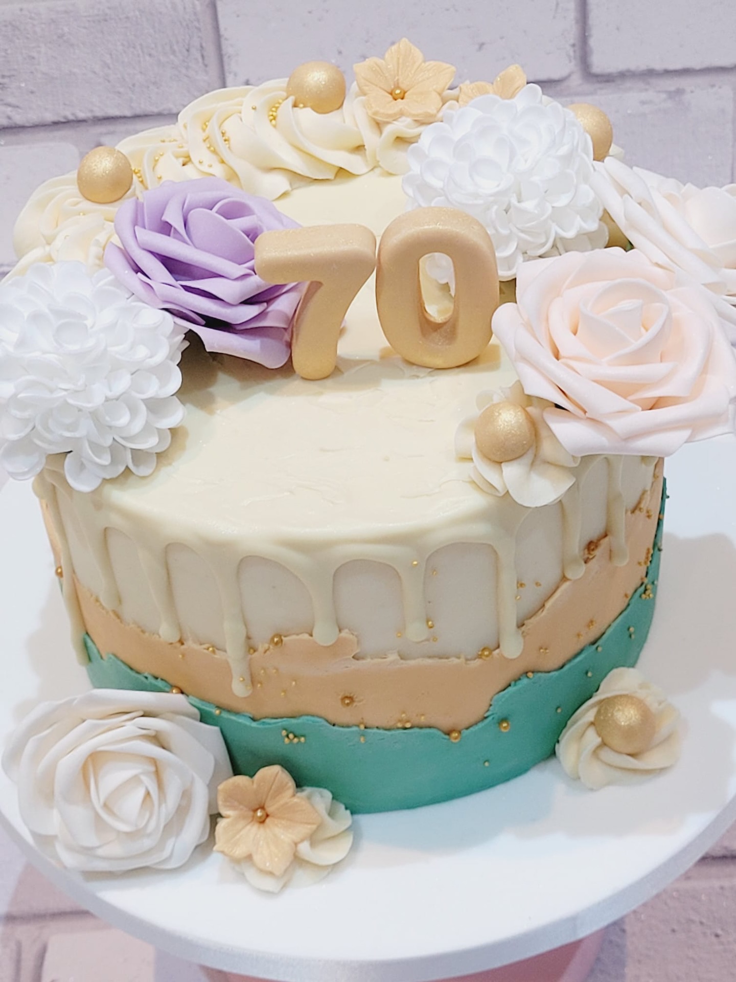 Seventy & stunning ✨
A beautifully handcrafted celebration cake featuring soft pastel tones, delicate florals, and elegant gold accents, because every milestone deserves a touch of luxury. Sweet, stylish, and made to honor a lifetime of memories.
#birthdaycake #dripcakes #ElegantCakes #CelebrationCake #cakedesigner