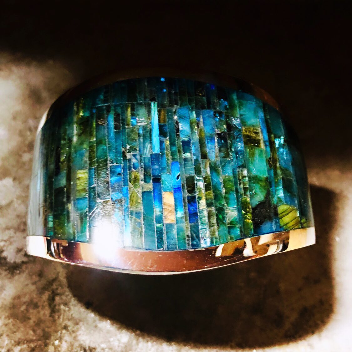 For a very special collector. 2” inches wide, Labradorite cuff. Weeks in the making! It took awhile (several tries) to figure out this beautiful, yet difficult stone. 💚💚💚 #iridiscent #labradorite #bracelet #cuff #nativeamerican #zuni #inlay #colincoonsis