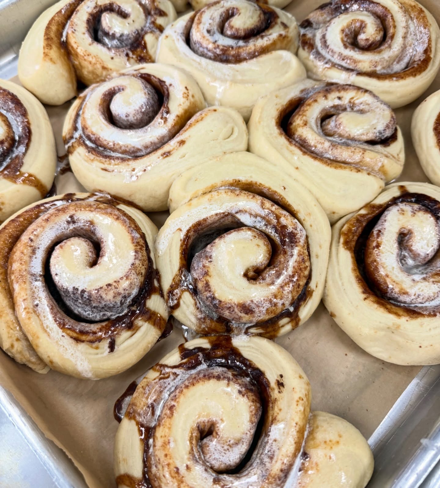 Good morning and happy Saturday friends!! We are at the bakery today from 9-2 and we have two full display cases filled with delicious goodies for you!
Looking for a quick and delicious breakfast? Head on over to the bakery and treat yourself to our fresh-made cinnamon rolls—pulled straight from the oven! 🤤
And the best part? These aren’t your average cinnamon rolls… they’re BIG—like, as big as your hand! 🙌
So go ahead, grab one… or two (we won’t tell 😉) and start your day off the sweetest way possible!