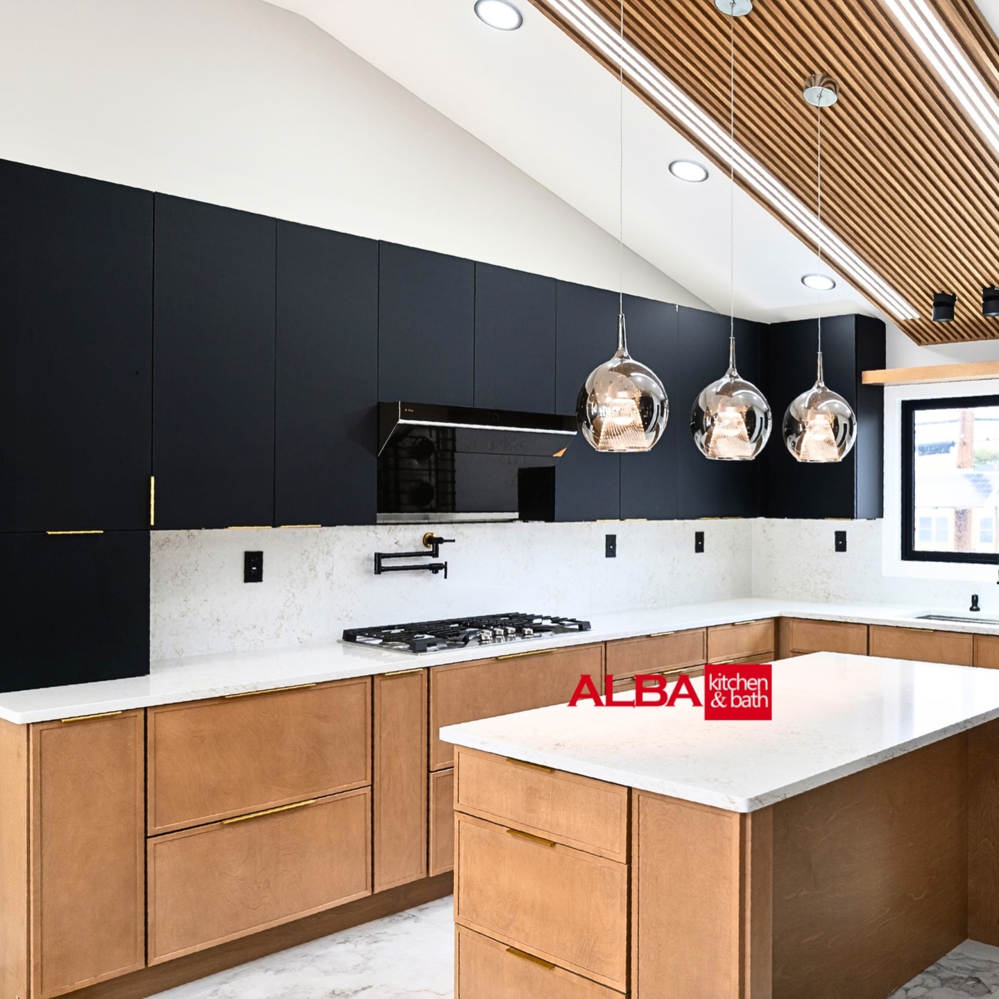 In our recent project our designers created a sleek, modern, and minimalist space featuring flat-panel doors combined with thin shakers. We maximized it with custom storage spaces. Our design blended into the aesthetic of the house. #kitchengoals #kitchendesign #contemporary #modernkitchen