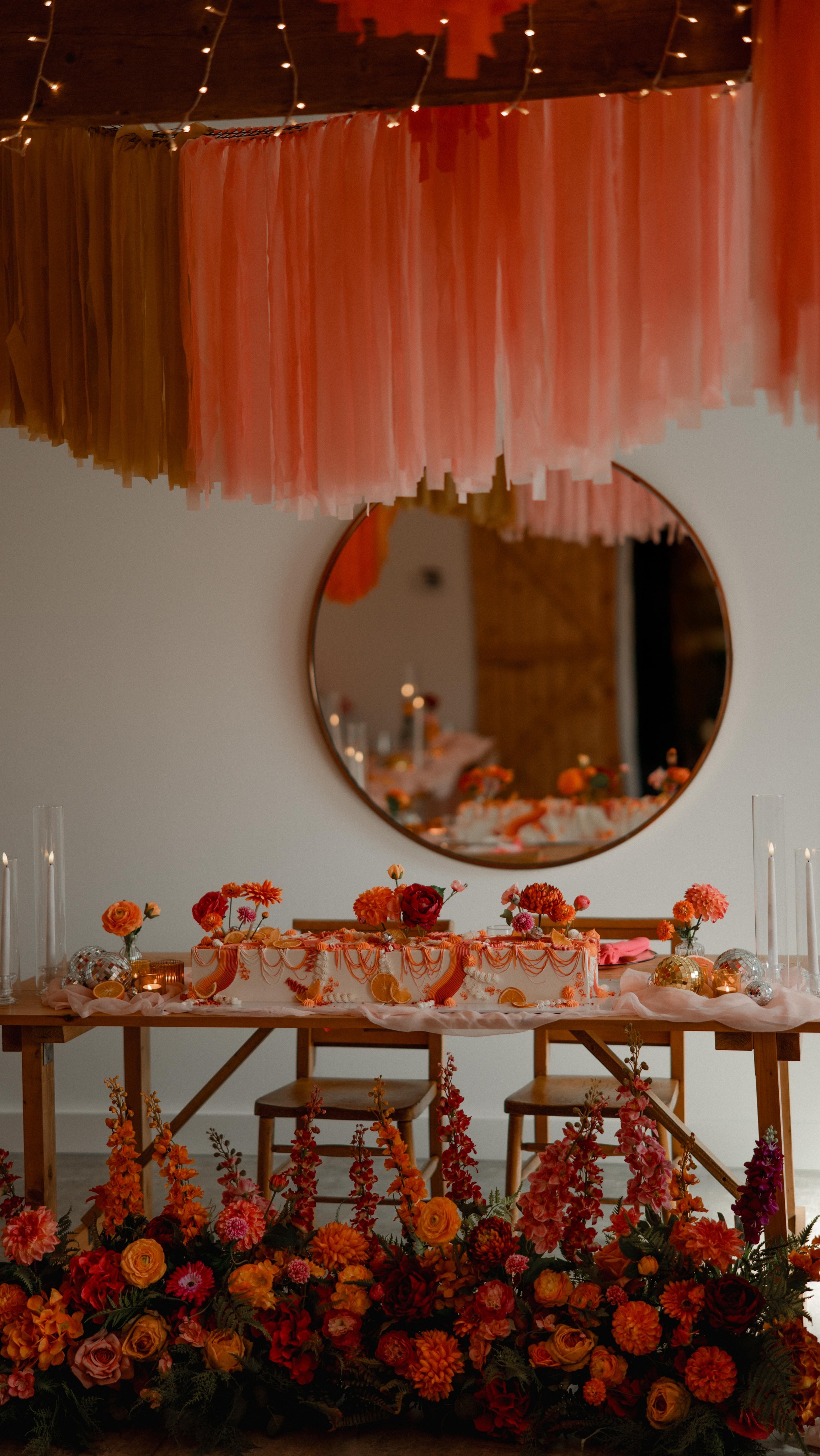 This long table cake may just be my favourite yet 🥰
White buttercream and covered in pink and orange swirls, real orange slices, raspberry sprinkles, DISCO BALLS and (faux) florals.
It makes the perfect focal point for your top table and gets everyone involved as they are so easy to slice and serve.
Would you choose a long wedding cake for your big day?
Planner - @leahtheweddingplanner
Model - @elsmusic_
Styling - @rubyandcoevents
Florals - @fauxflowerevents
Photographer & cover photo - @ejcaptureweddings
Venue - @stockwithmill
Bridal Dress - @caroline.chamberlainbridal
Bridal Shoes - @prettypanachebridalwear
Hair & Make up - @adm.makeupartist_hairstylist
Content Creator - @tegadigitalmarketing
Cake - @cakeandthistle
Cake Bar - @thecakebarbycakeandthistle
Stationery - @mallyscrafts
Handmade Jewellery - @mariapolianska_design