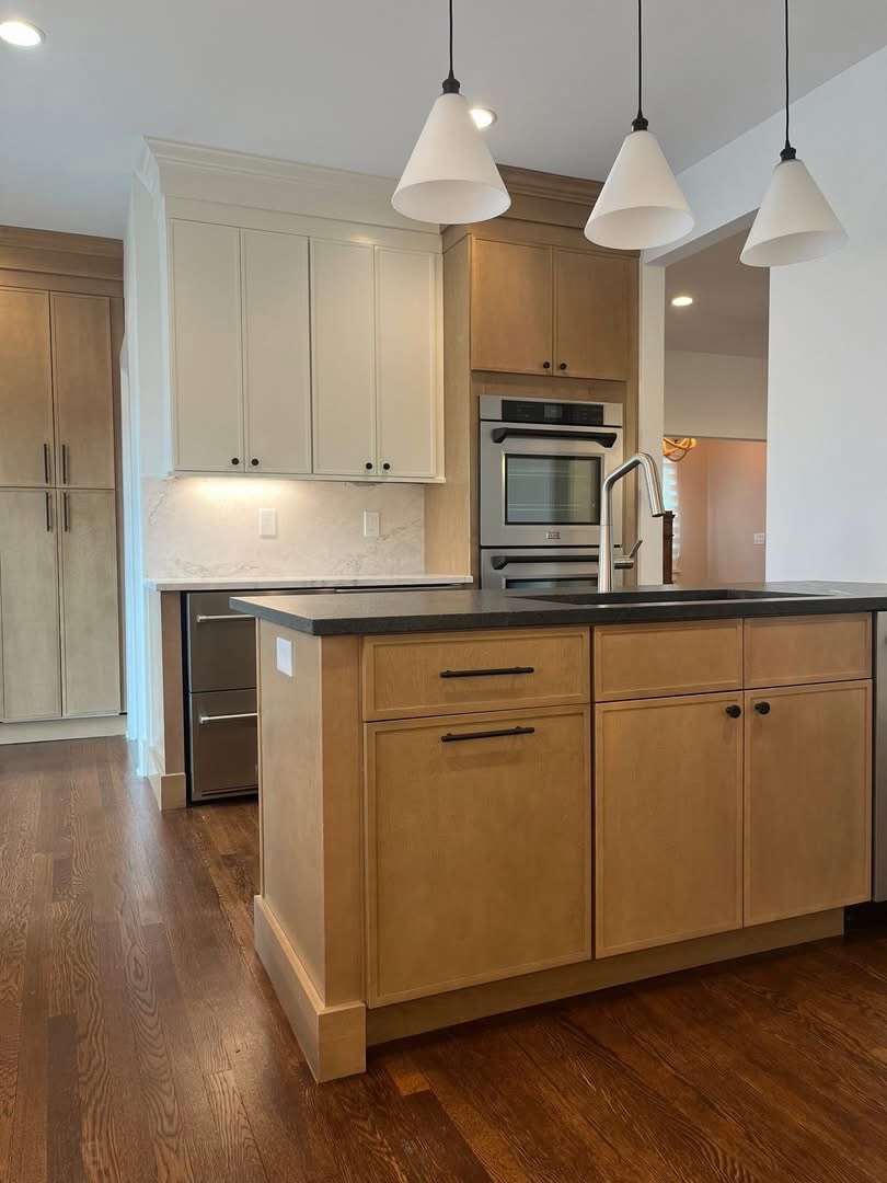 Kitchens are the heart of every home, where memories are made and time is spent. Our goal as your design-build contractor is to combine stunning design with functionality, delivering a clear plan after several meetings before project start.
This renovation included: • Demolishing walls and installing a structural beam for open concept design • Adding a downstairs powder room • Creating an office space in the original kitchen area • Realigning the back entry door to match the deck and powder room for effortless entertaining. Visit our Design Center for design consultation and beautiful material selection. Call 203-778-9385 to discuss your next project.
#openconceptkitchen #designbuildcontractor #fairfieldcountyct #kitchenrenovations #homeimprovementprojects